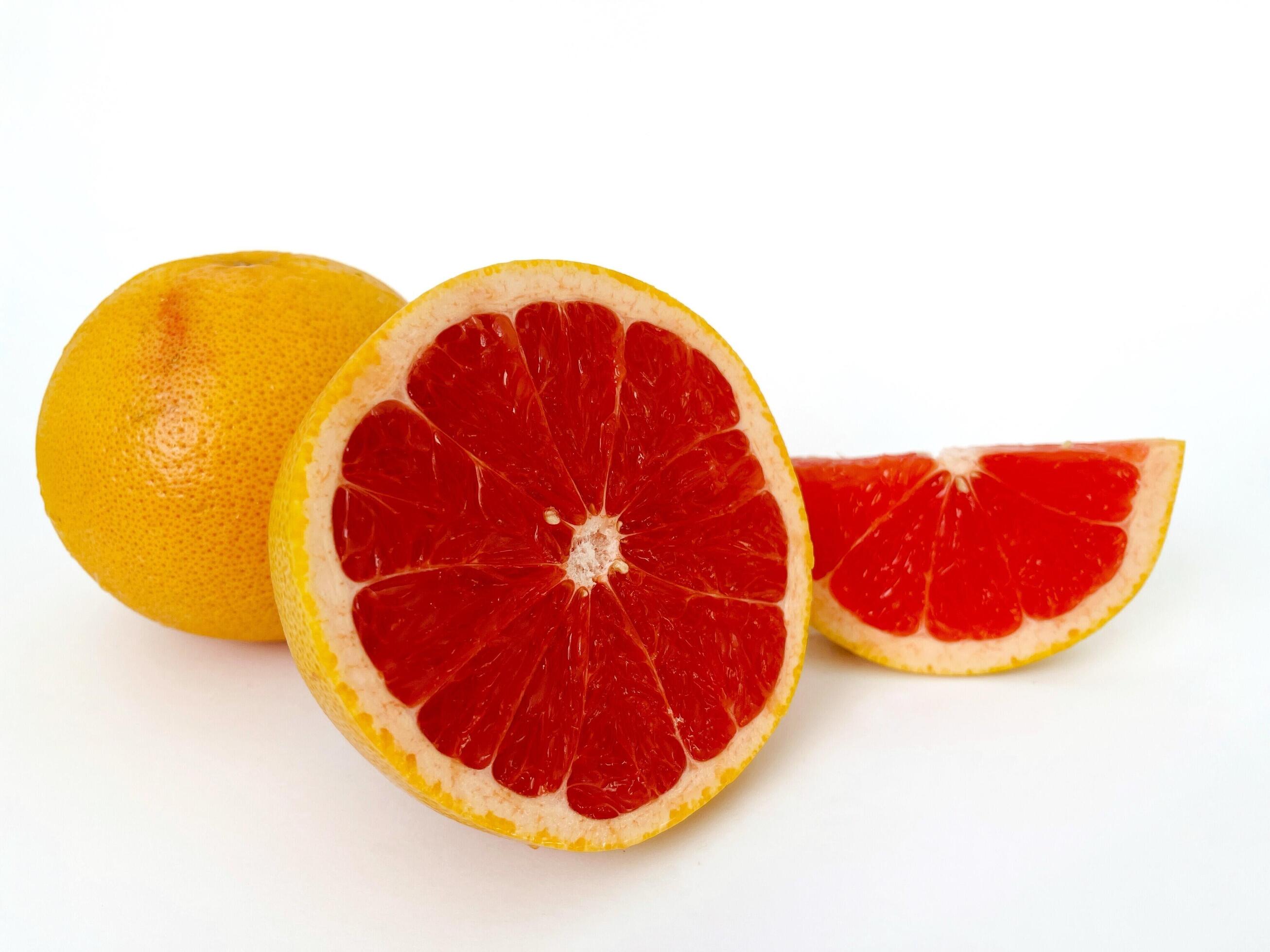 Fresh grapefruit fruit. Grapefruit isolated on white background. Grapefruit with clipping path. Stock Free