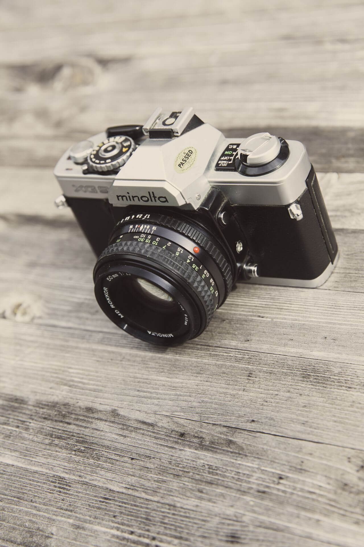 
									Minolta Camera on Wooden Surface Stock Free