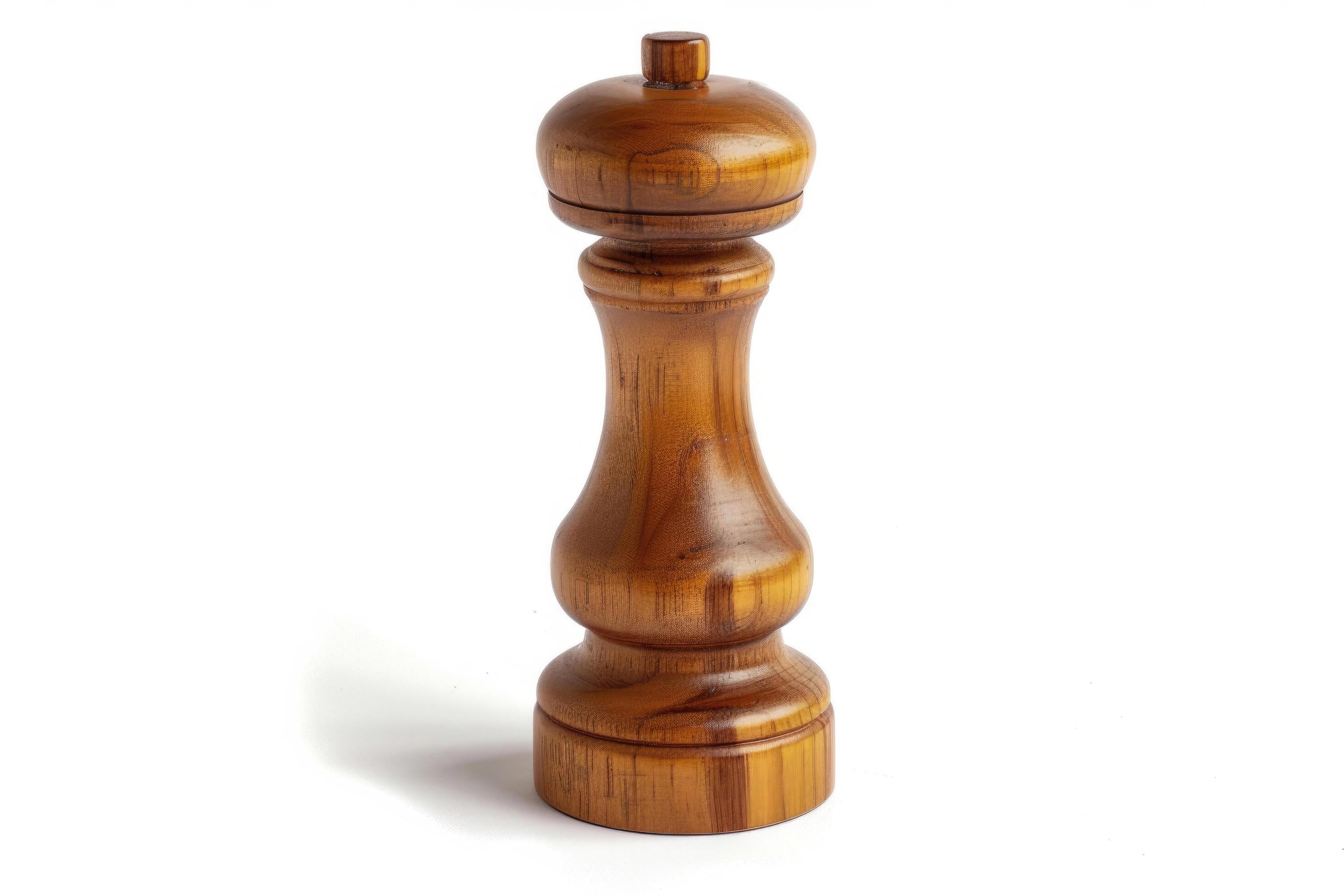 Wooden pepper mill on a white background. Stock Free