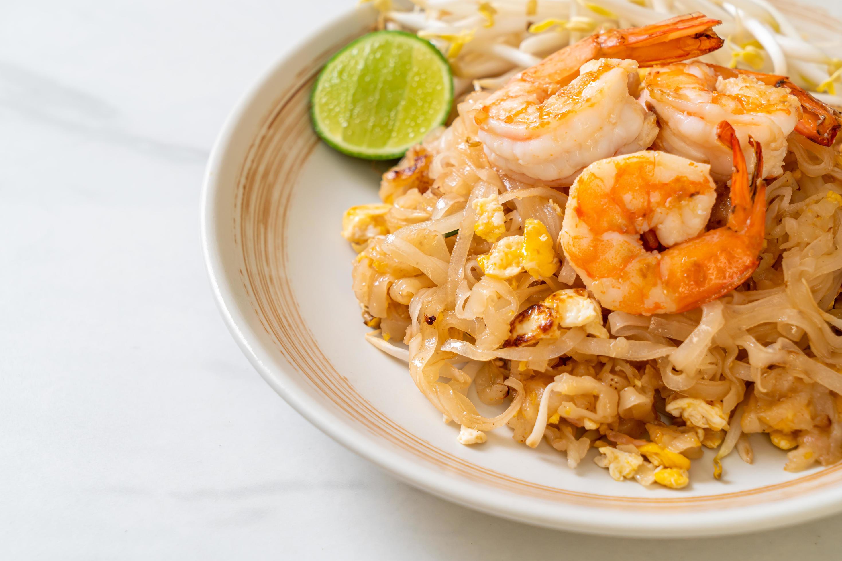 Stir-fried noodles with shrimp and sprouts or Pad Thai – Asian food style Stock Free