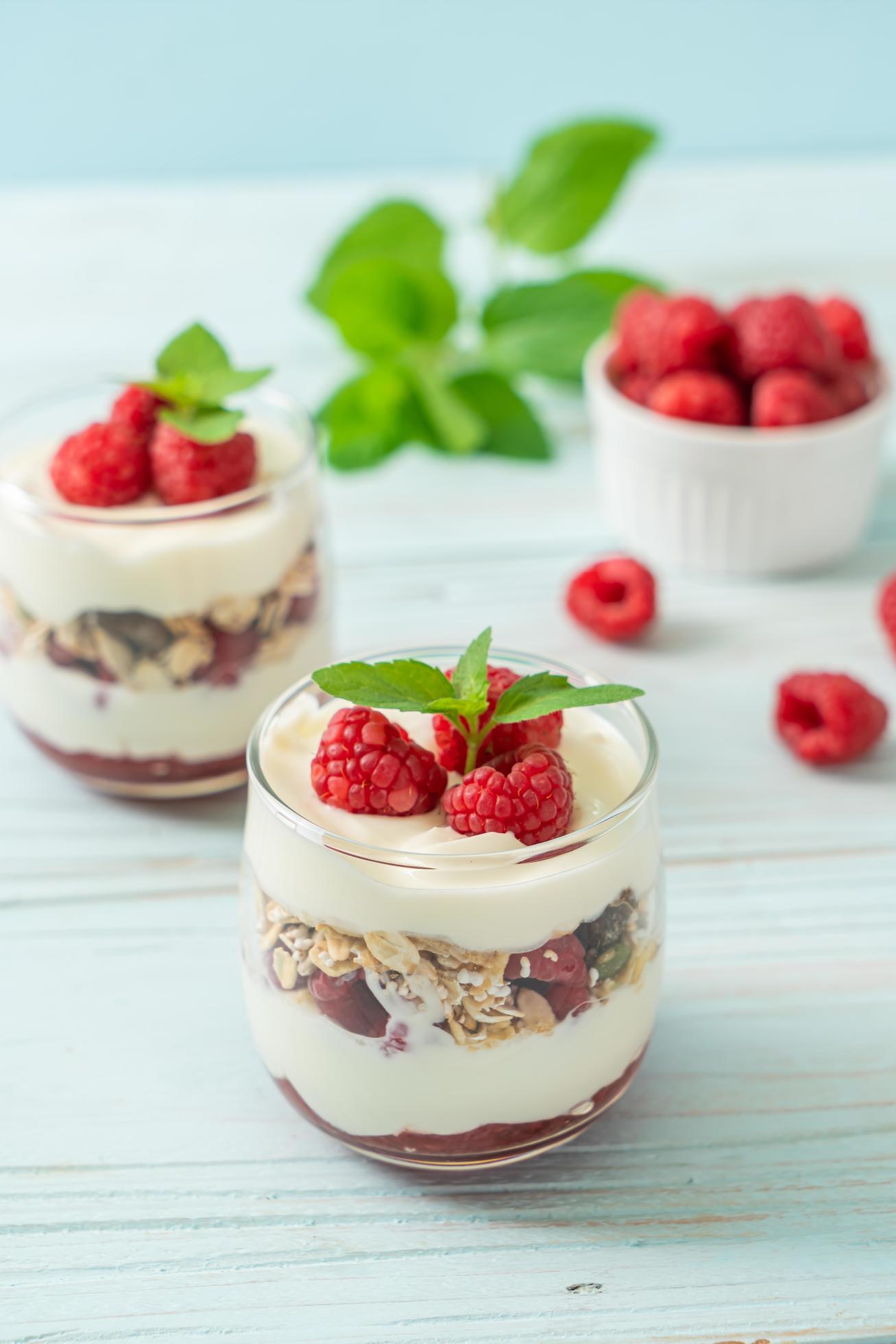 Fresh raspberry and yogurt with granola – Healthy food style Stock Free