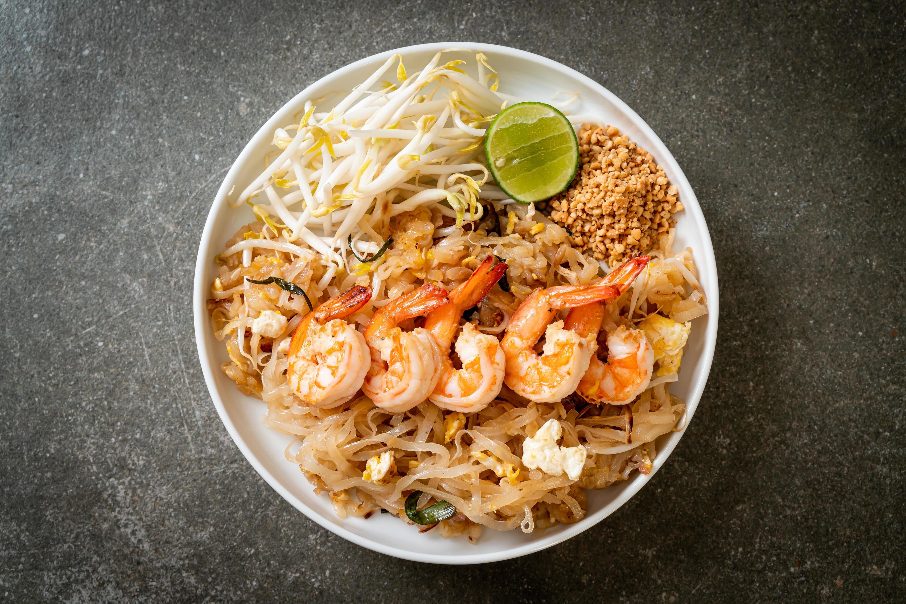 Stir-fried noodles with shrimp and sprouts or Pad Thai – Asian food style Stock Free