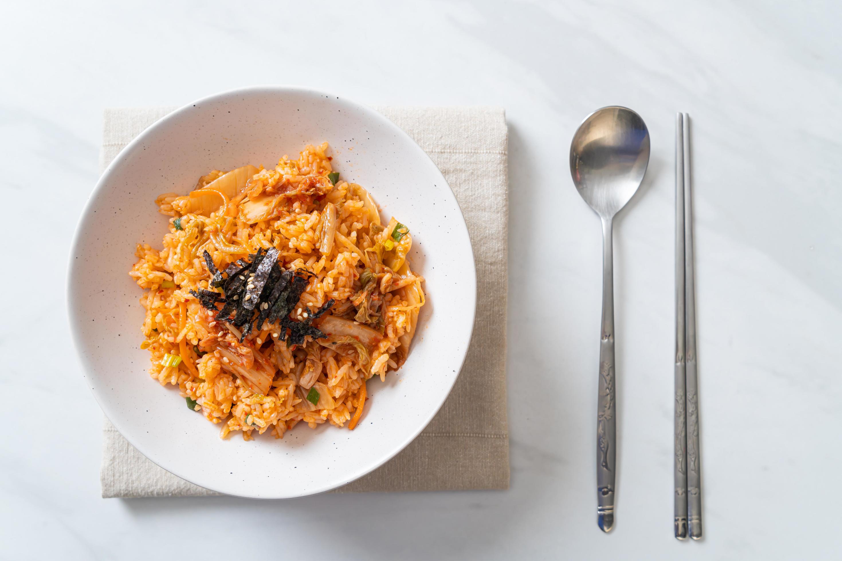 Kimchi fried rice with seaweed and white sesame – Korean food style Stock Free