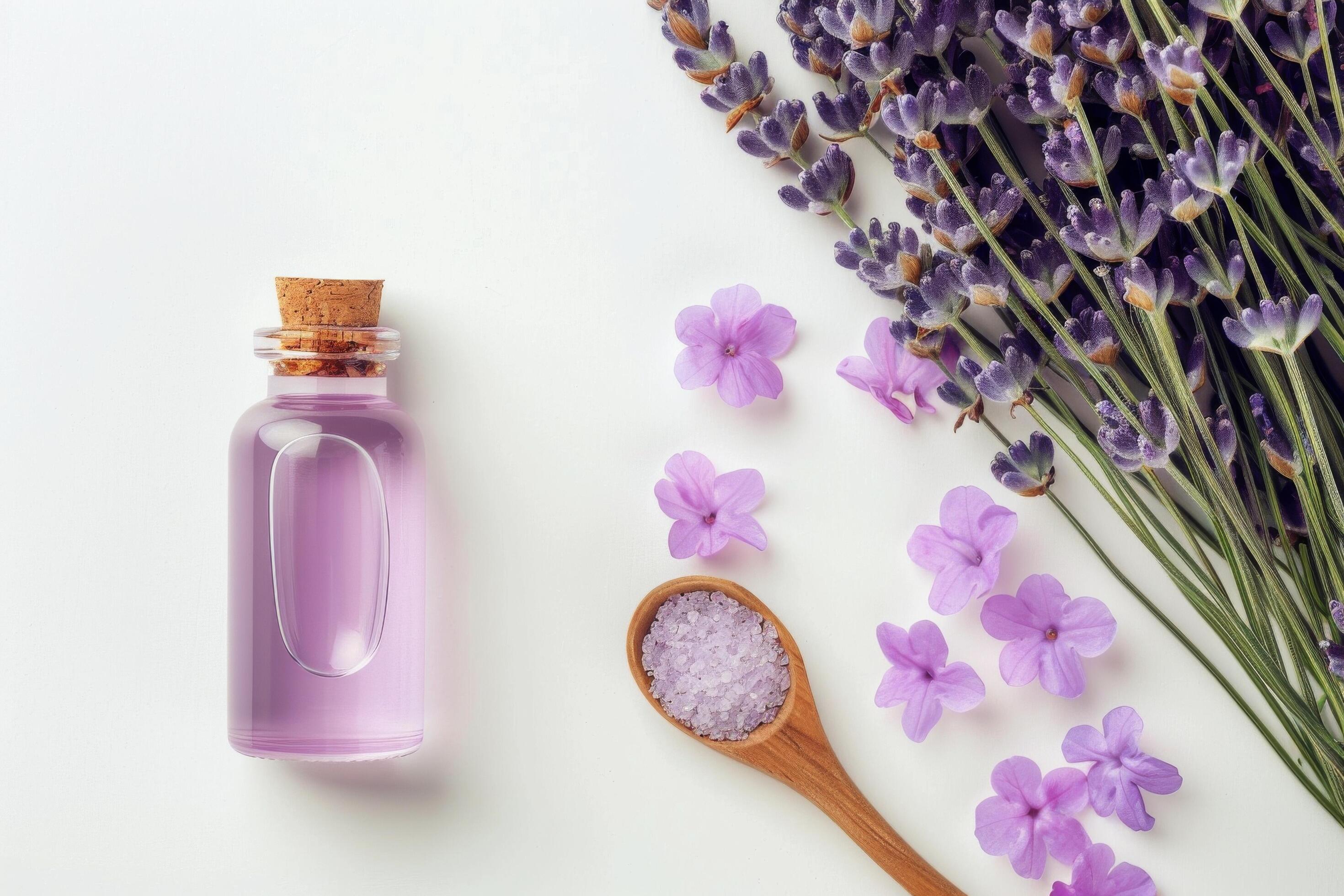 Lavender Essential Oil and Flowers on White Background Stock Free