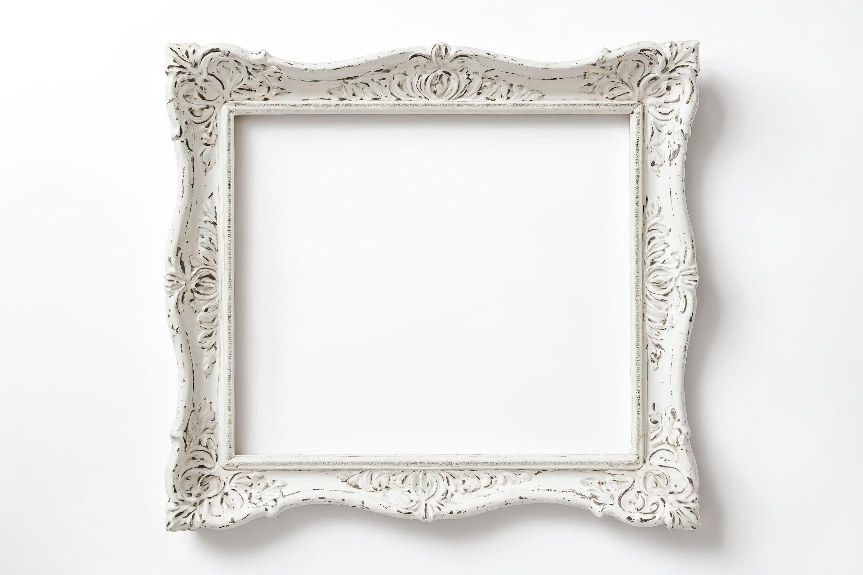 White ornate picture frame isolated on white background Stock Free