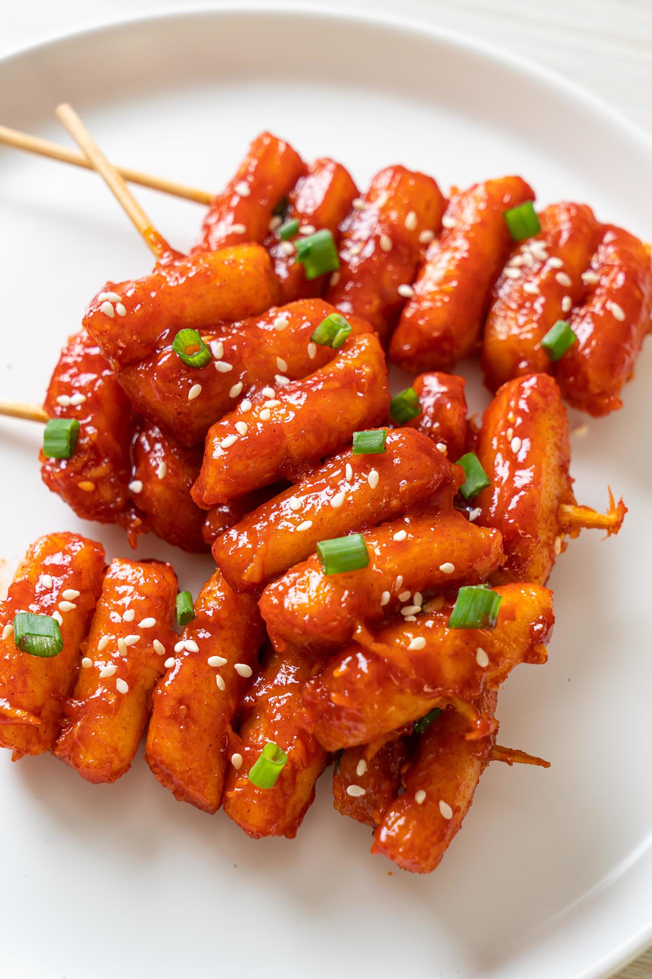 Deep-fried Korean rice cake, or Tteokbokki, with spicy sauce – Korean food style Stock Free