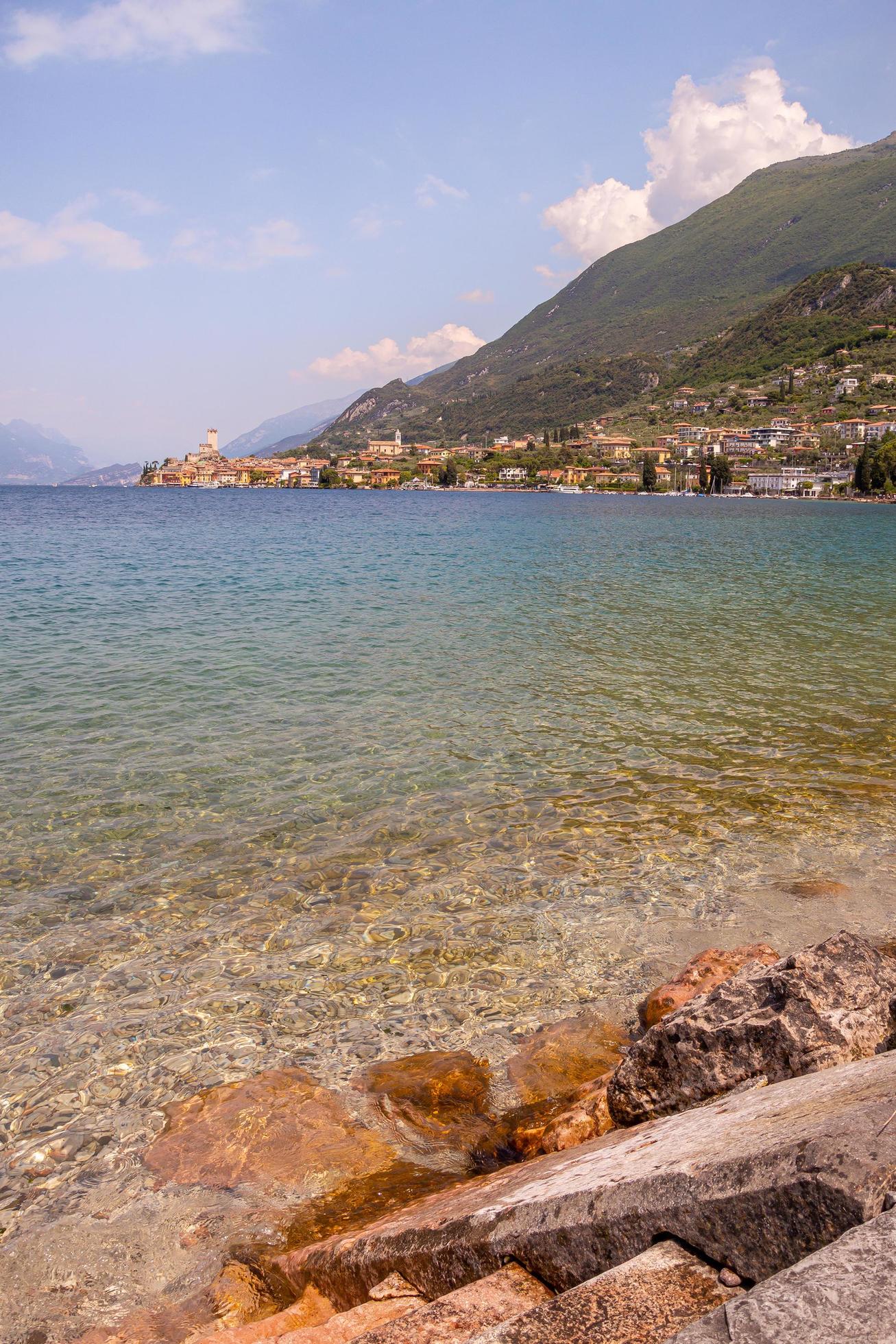 View from lakeside walkway to famous mediterrean town Malcesine, Lago di Garda Garda lake, Italy Stock Free