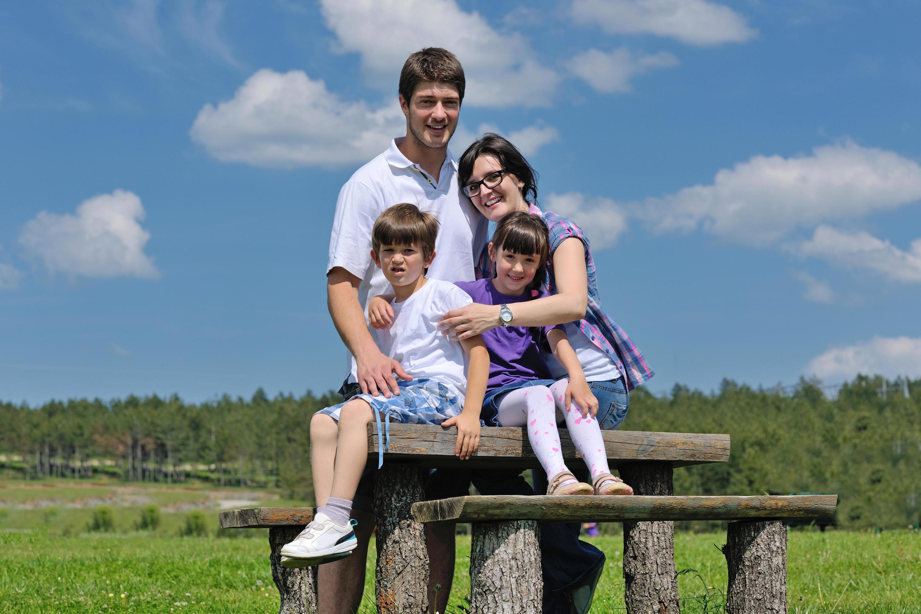 happy young family have fun outdoors Stock Free