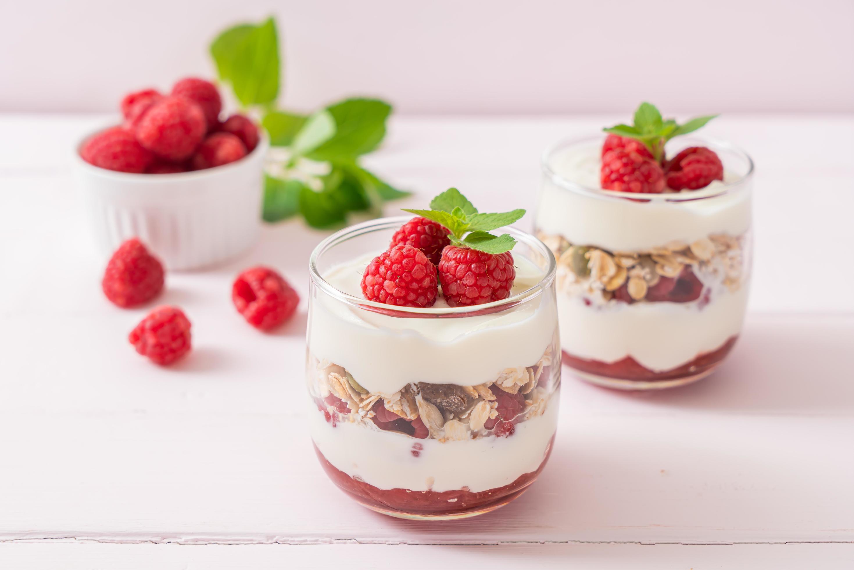 Fresh raspberry and yogurt with granola – Healthy food style Stock Free