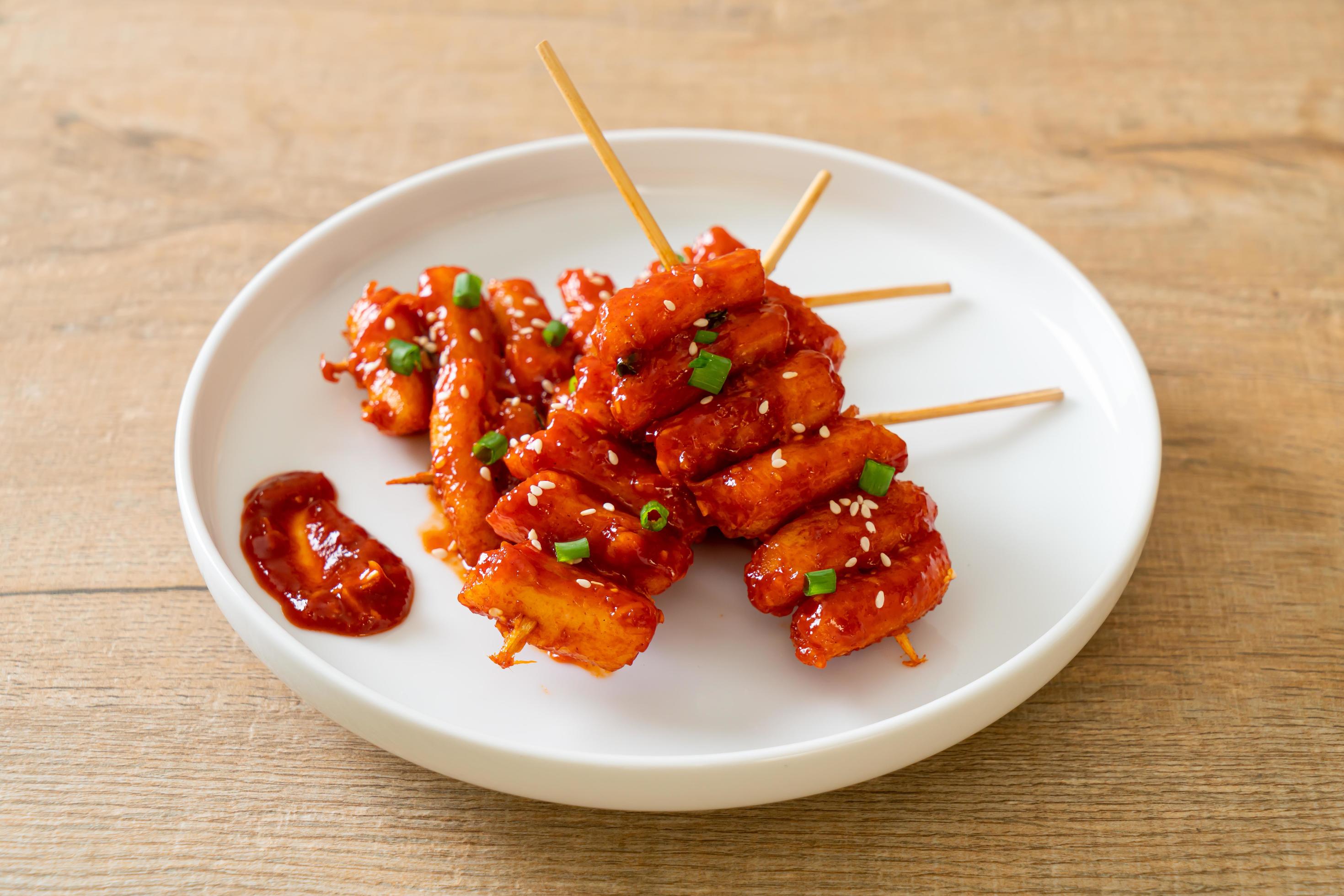 Deep-fried Korean rice cake, or Tteokbokki, with spicy sauce – Korean food style Stock Free