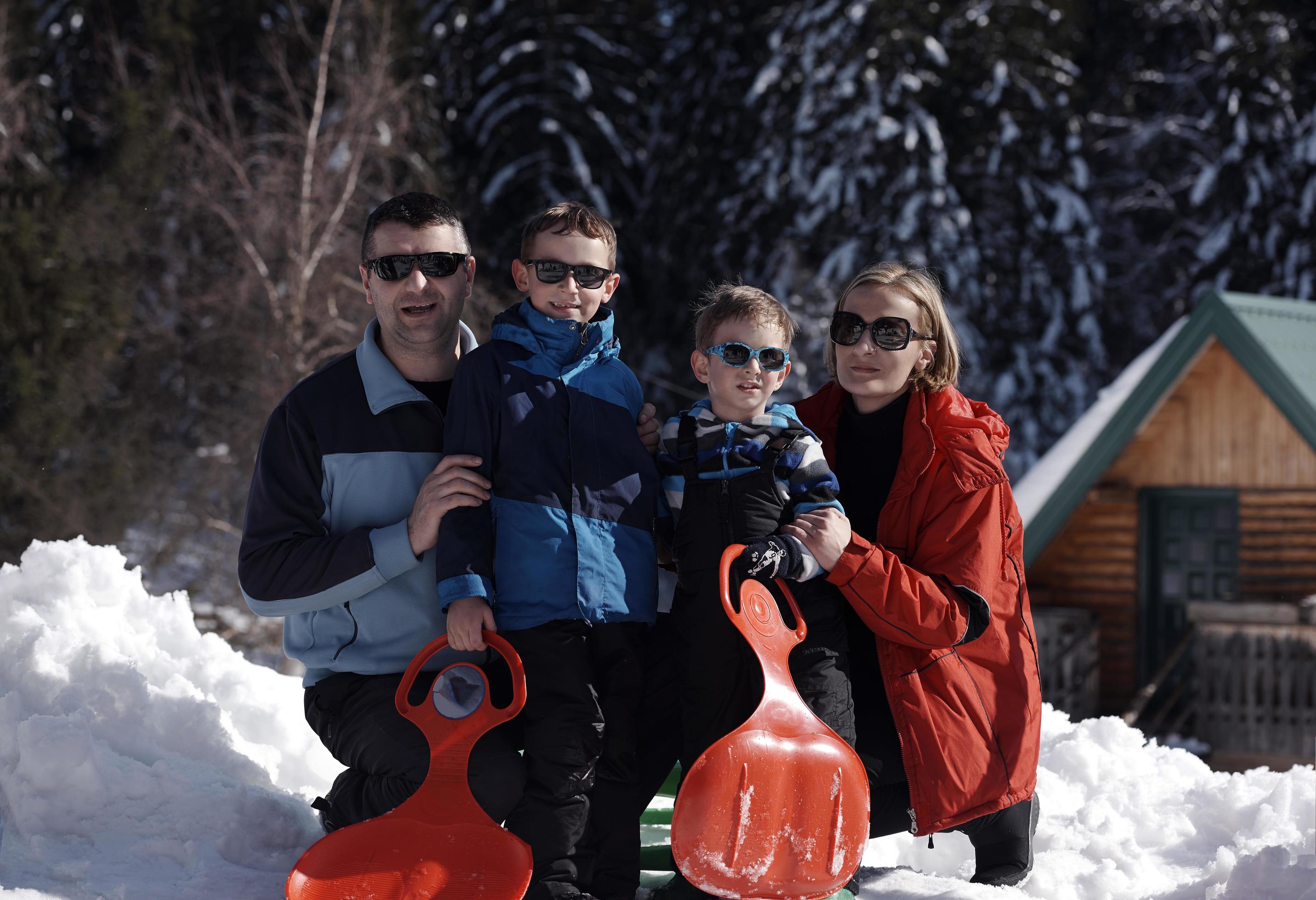 family portrait at beautiful winter day Stock Free