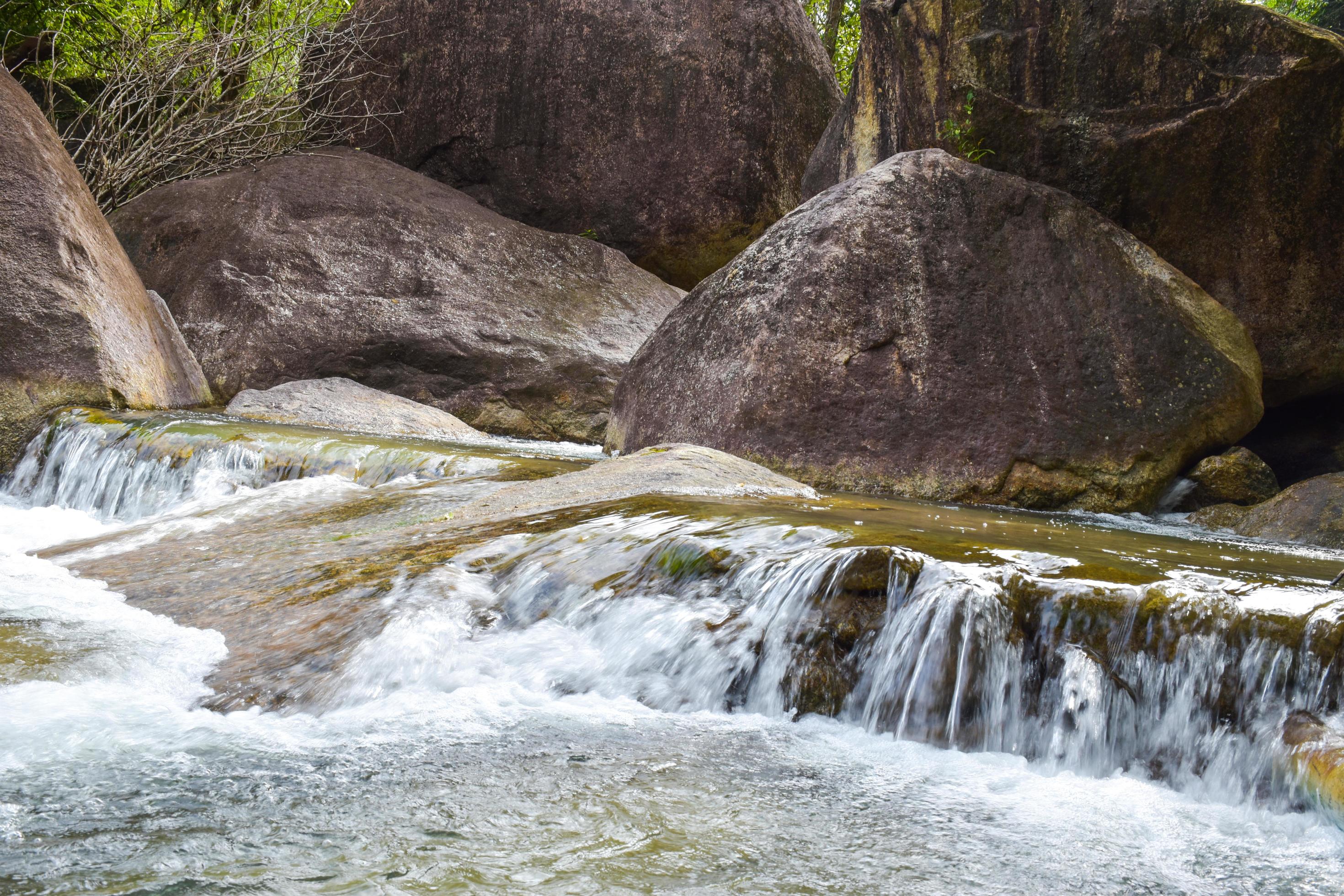 sunlight beauty nature and rock waterfall in south Thailand Stock Free