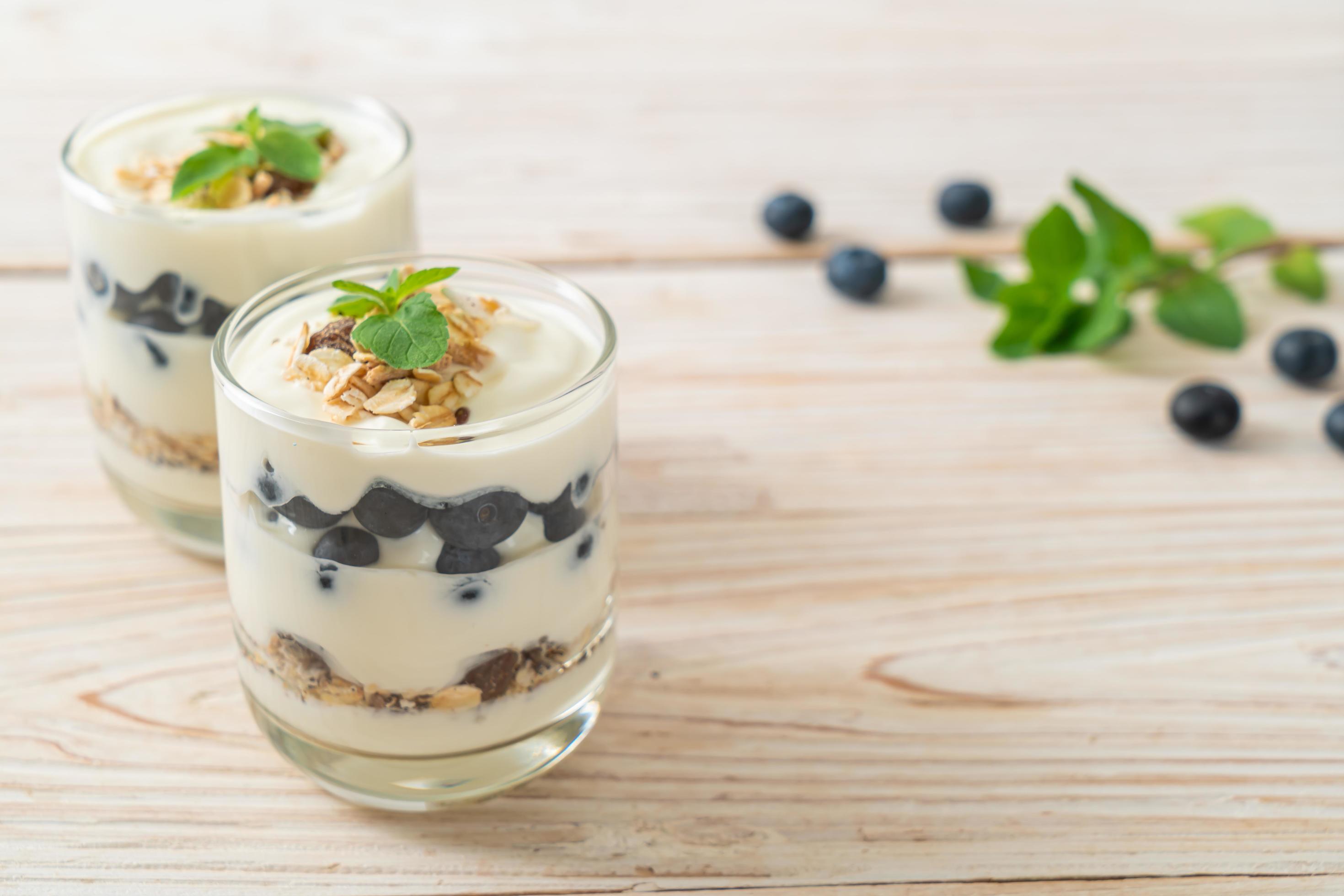 Fresh blueberries and yogurt with granola – Healthy food style Stock Free