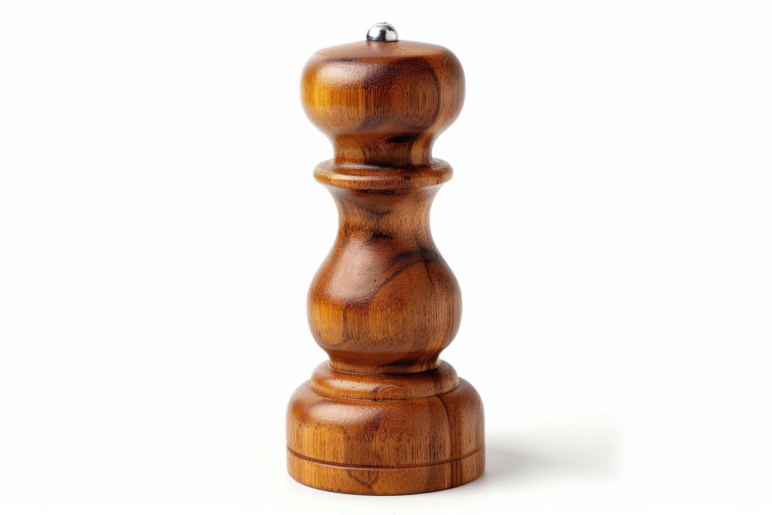 Wooden pepper mill on a white background. Stock Free