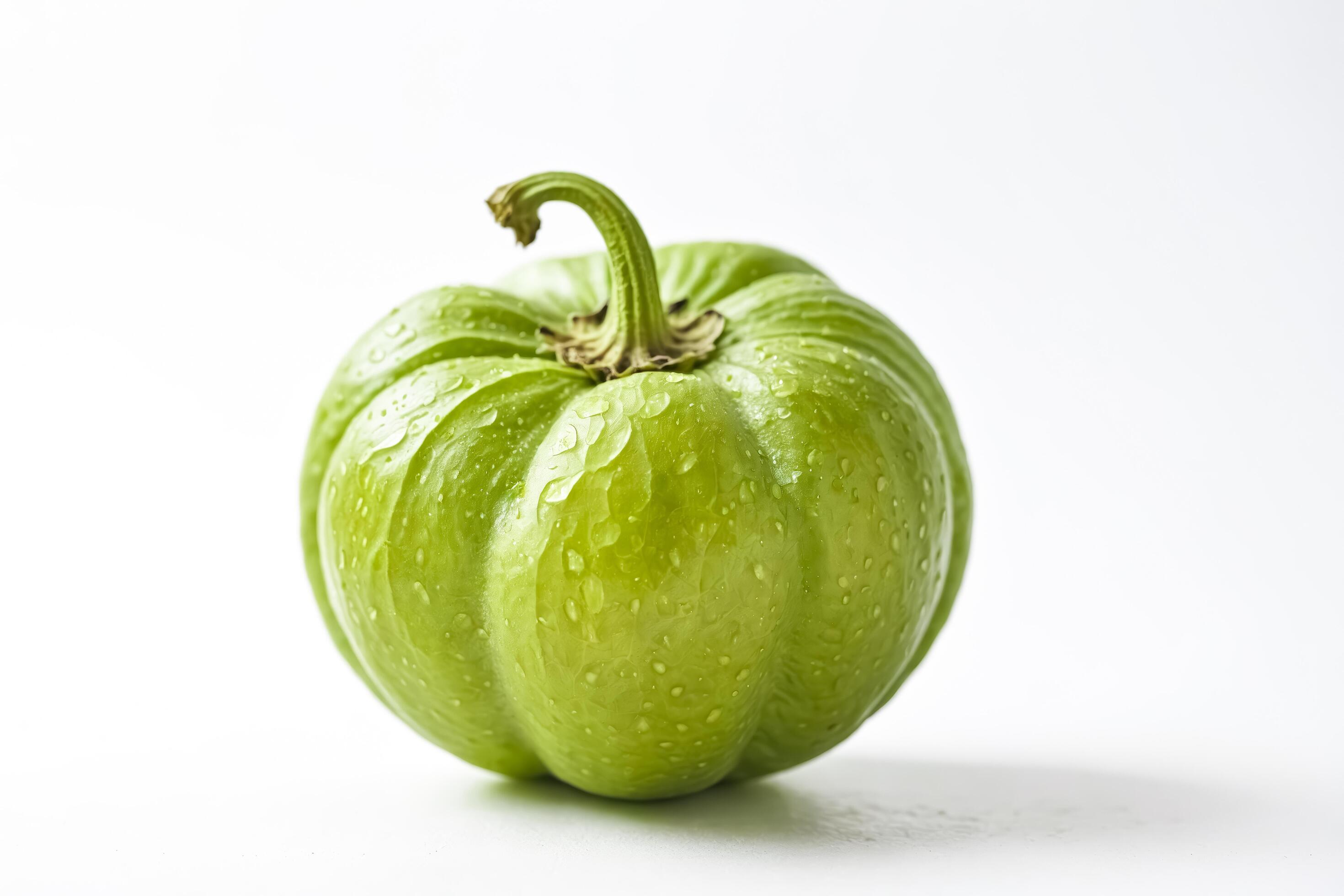 Green bell pepper with water droplets on white background Stock Free