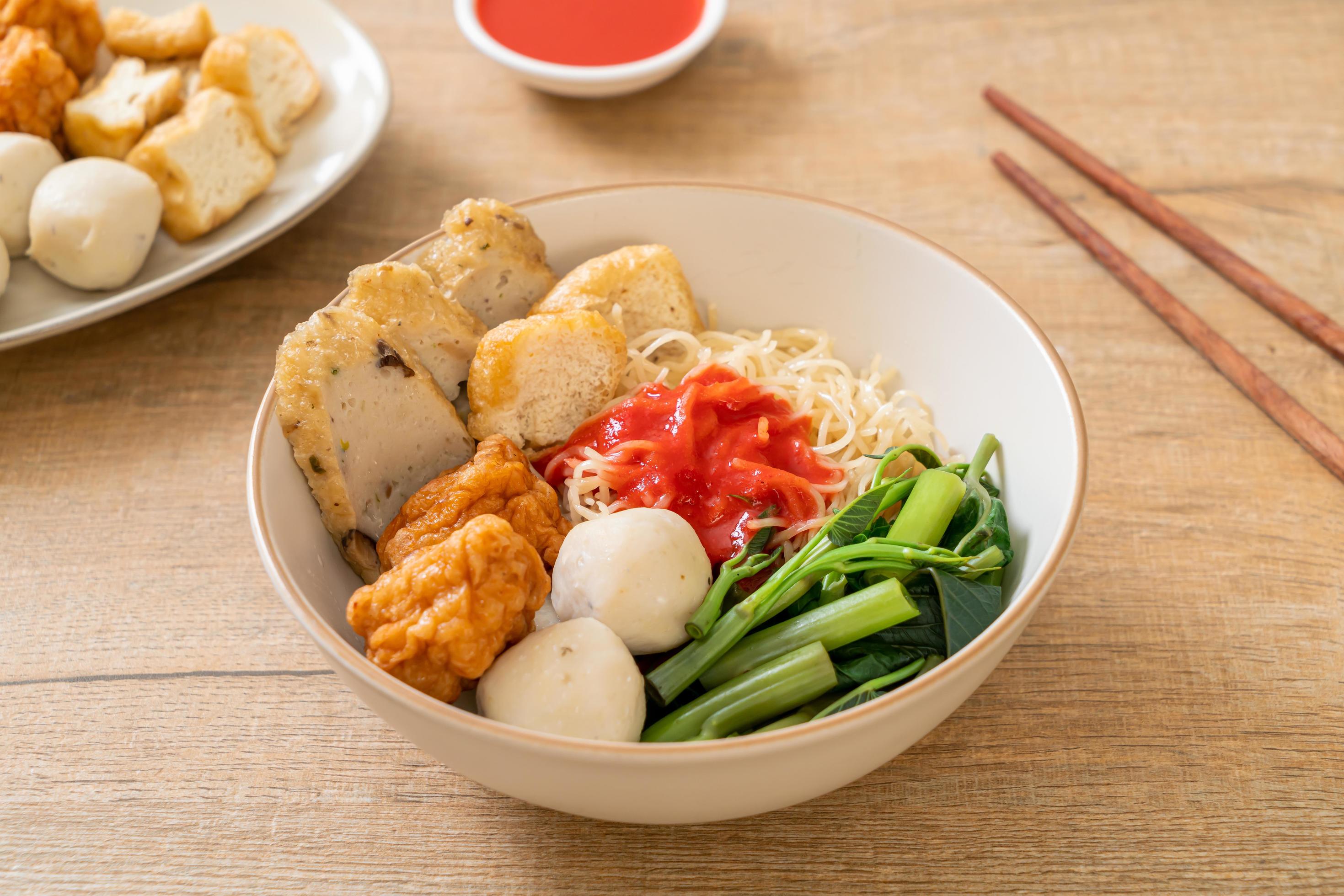 Egg noodles with fish balls and shrimp balls in pink sauce, Yen Ta Four or Yen Ta Fo – Asian food style Stock Free