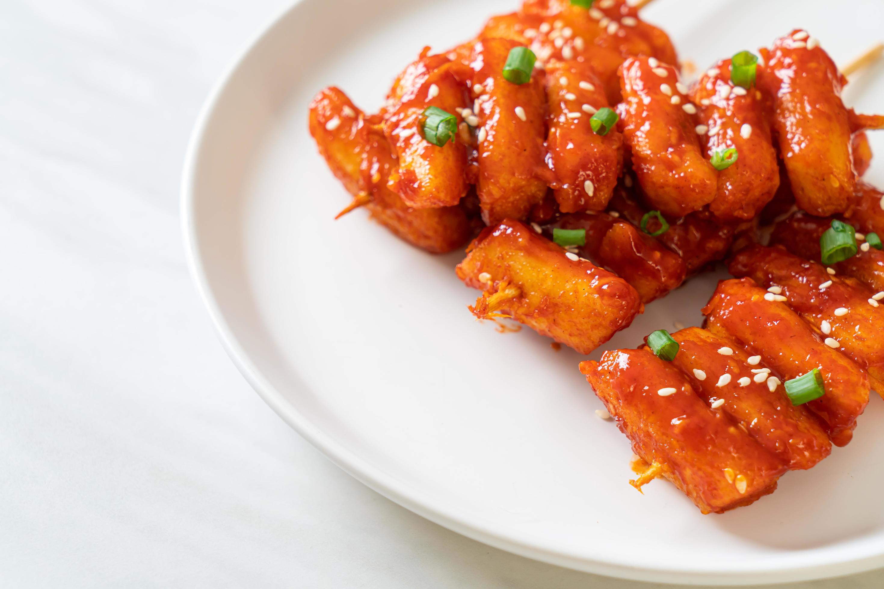 Deep-fried Korean rice cake, or Tteokbokki, with spicy sauce – Korean food style Stock Free