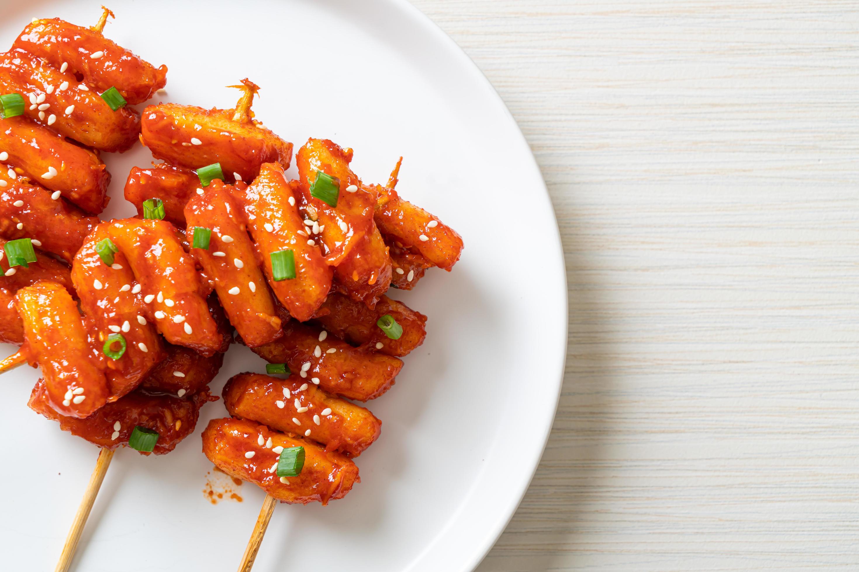 Deep-fried Korean rice cake, or Tteokbokki, with spicy sauce – Korean food style Stock Free