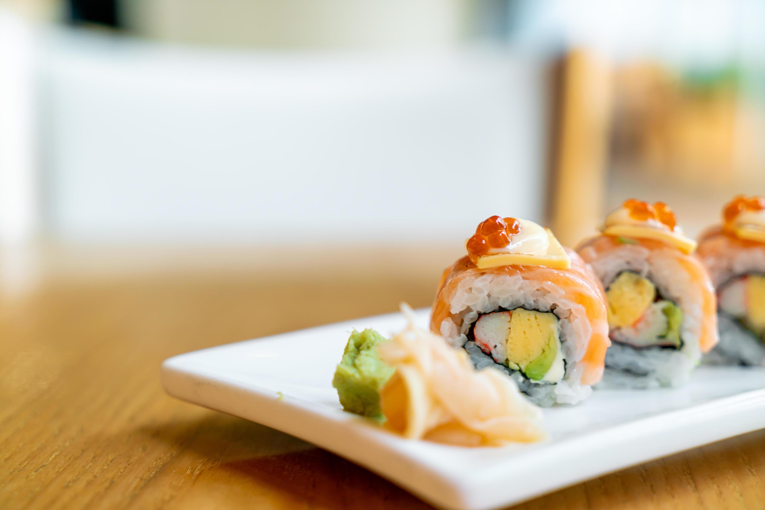 Salmon roll sushi with cheese on top – Japanese food style Stock Free