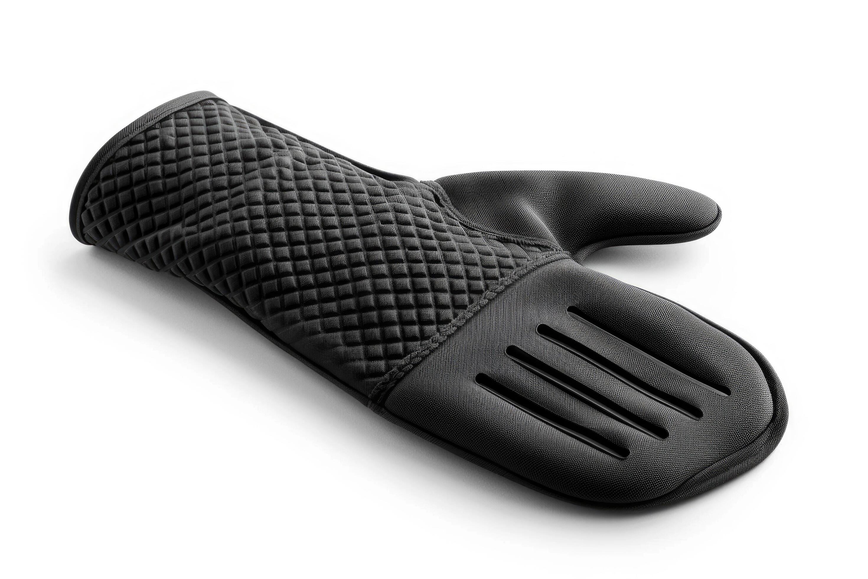 Black silicone oven mitt on a white background. Stock Free