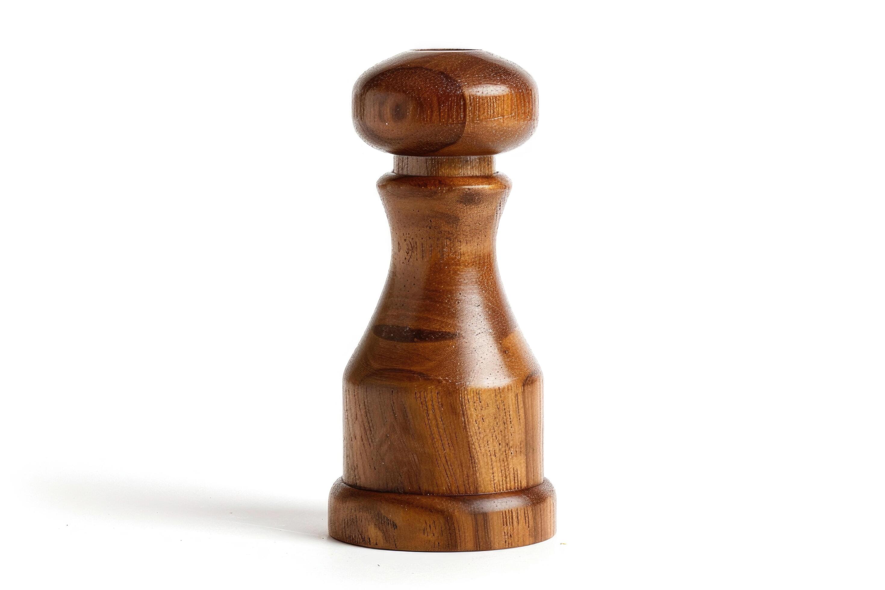 Wooden pepper mill on a white background. Stock Free