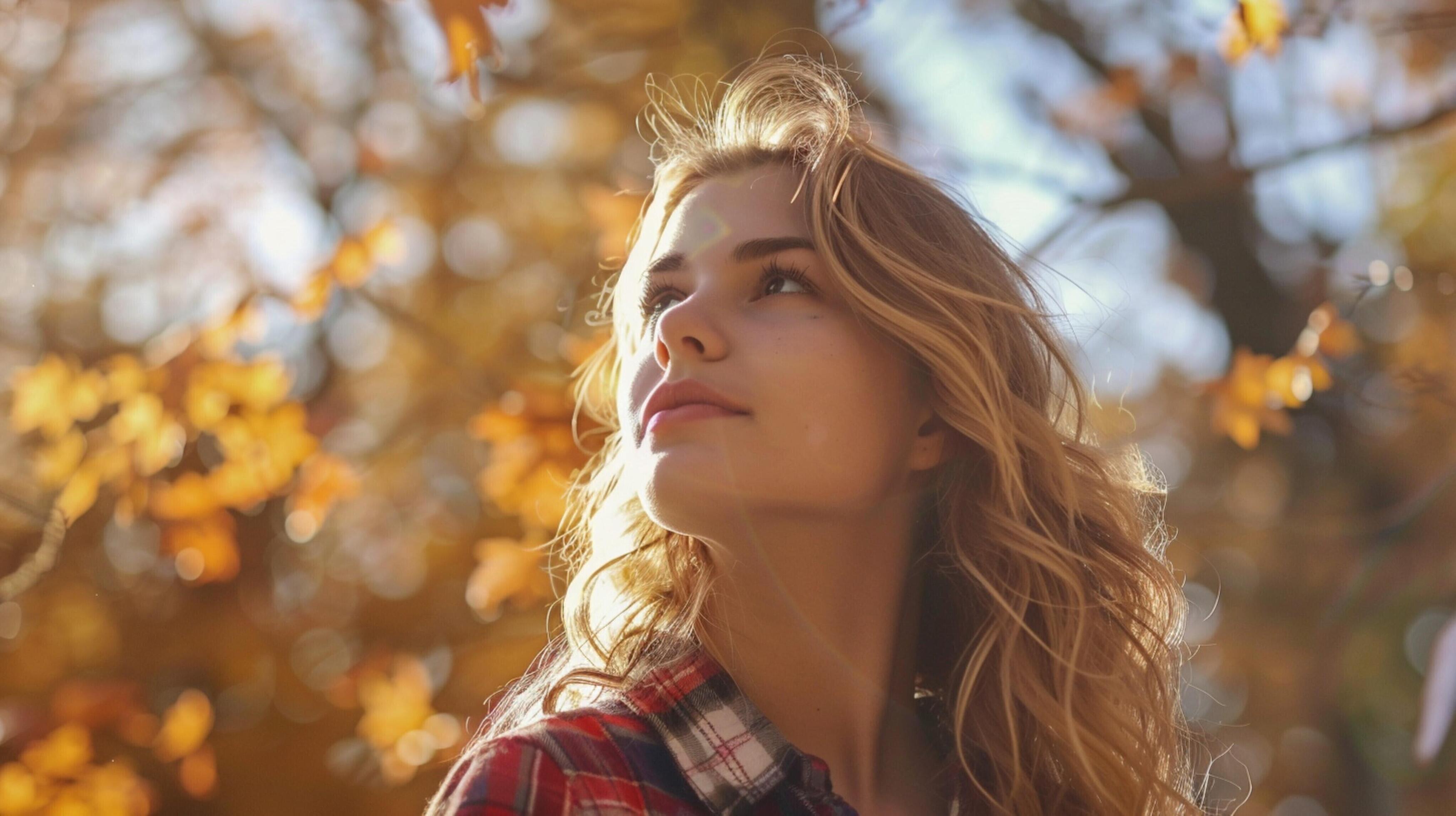 young woman with long blond hair enjoying autumn Stock Free