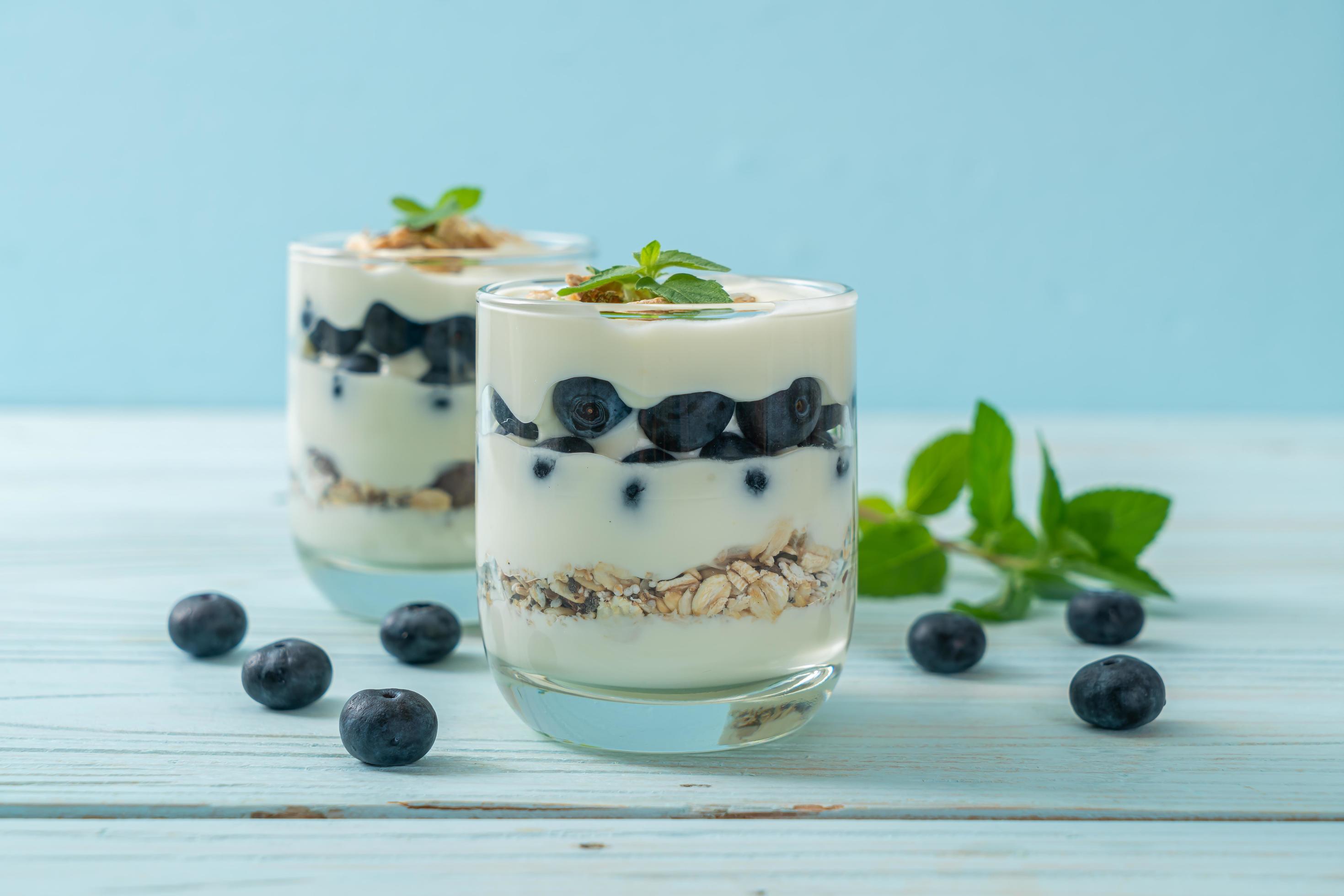 Fresh blueberries and yogurt with granola – Healthy food style Stock Free