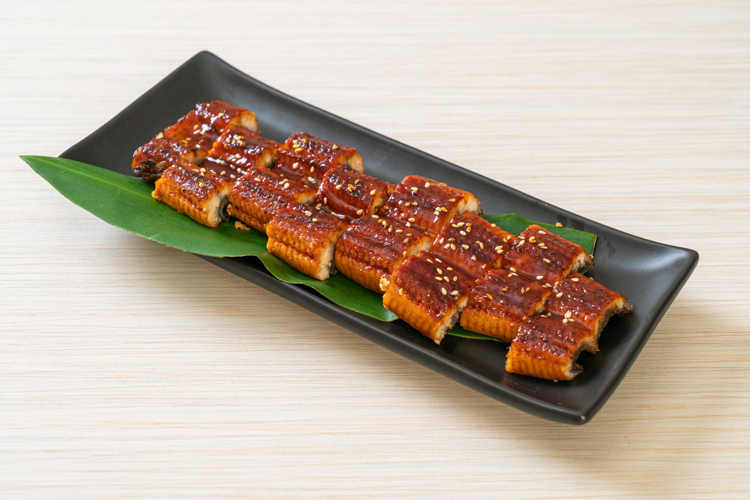 Sliced grilled eel or grilled unagi with sauce -Kabayaki – Japanese food style Stock Free