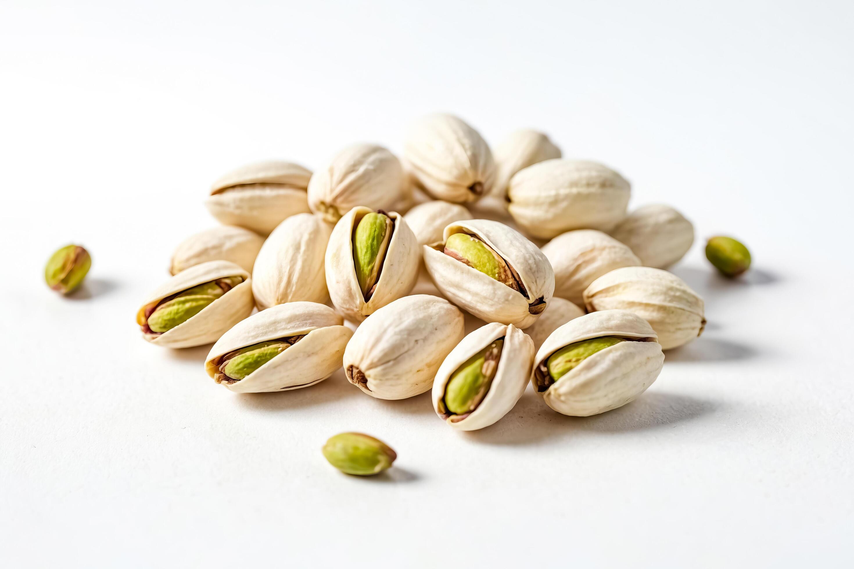 Close-up of pistachios on white background Stock Free