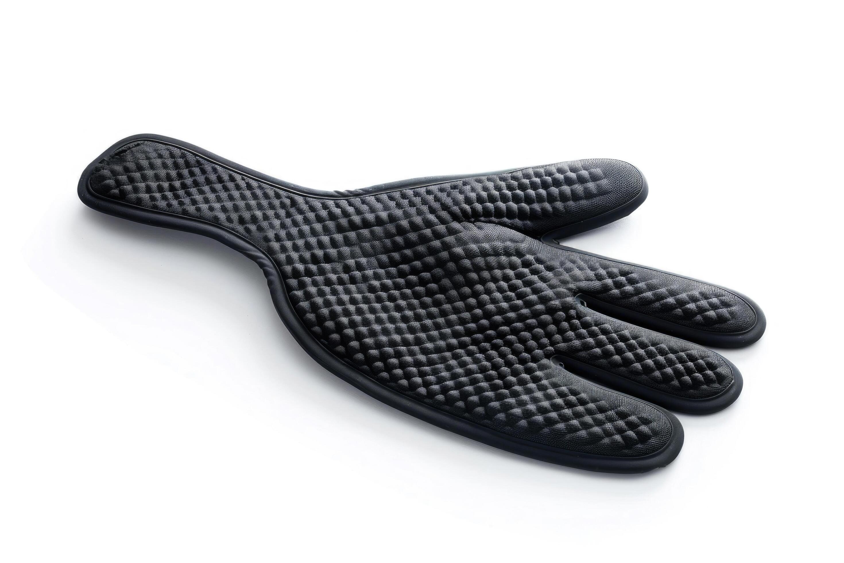 Black silicone oven mitt on a white background. Stock Free