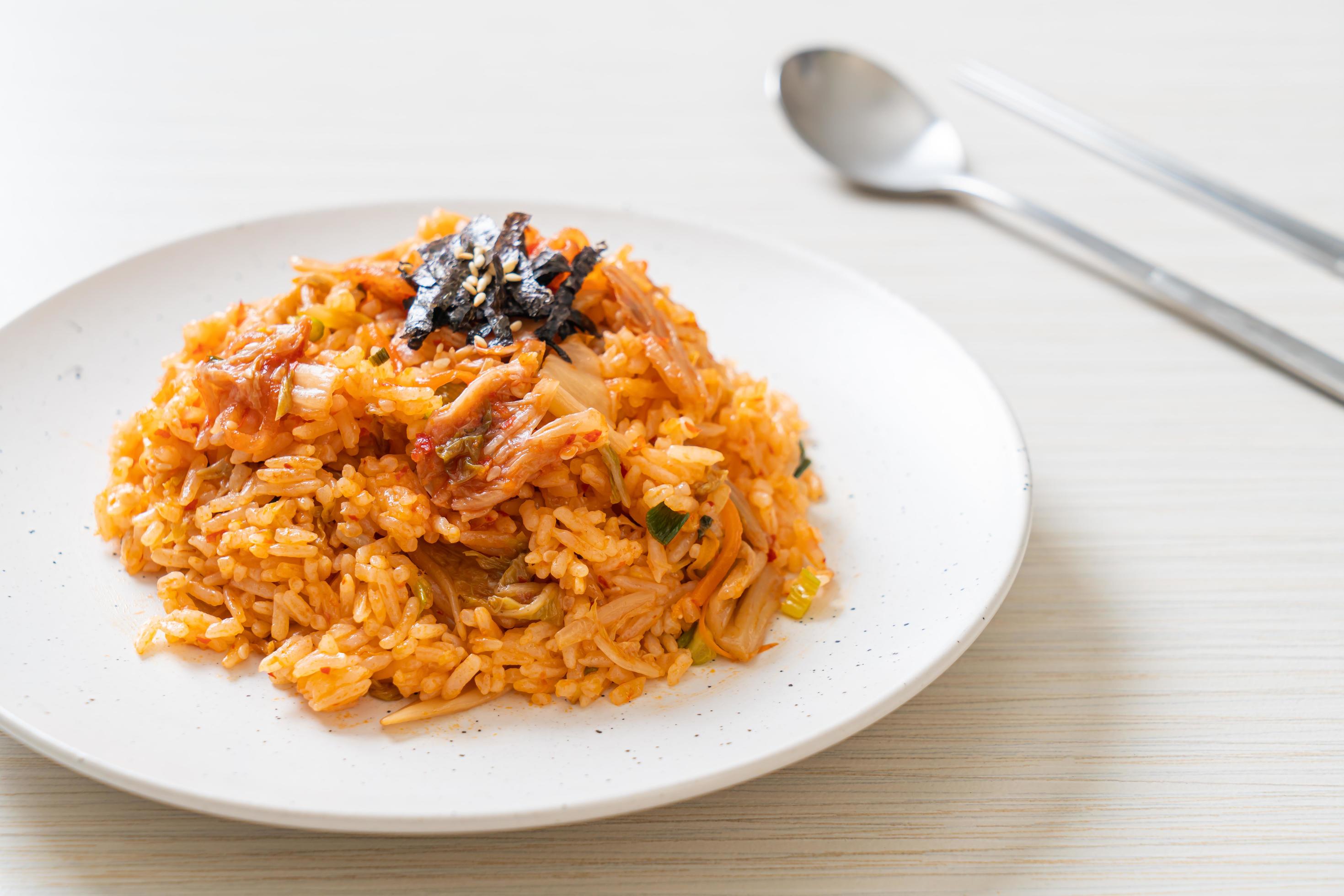 Kimchi fried rice with seaweed and white sesame – Korean food style Stock Free