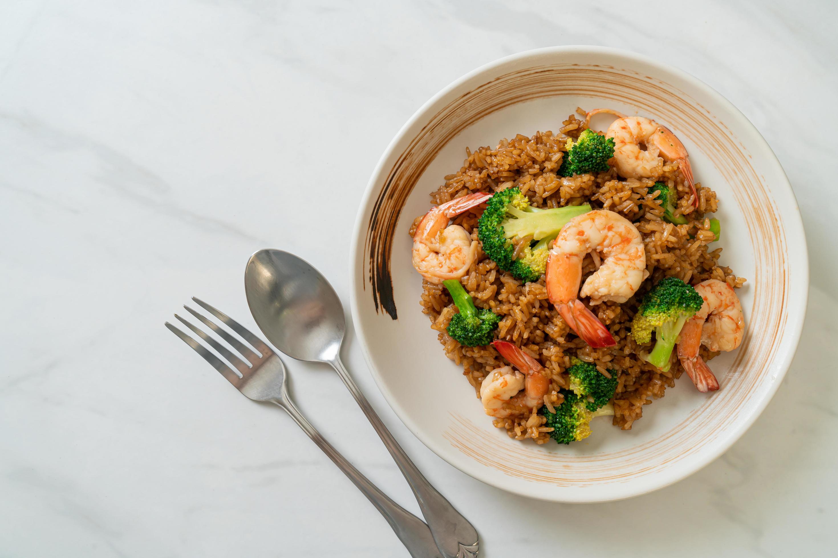 Fried rice with broccoli and shrimp – Homemade food style Stock Free