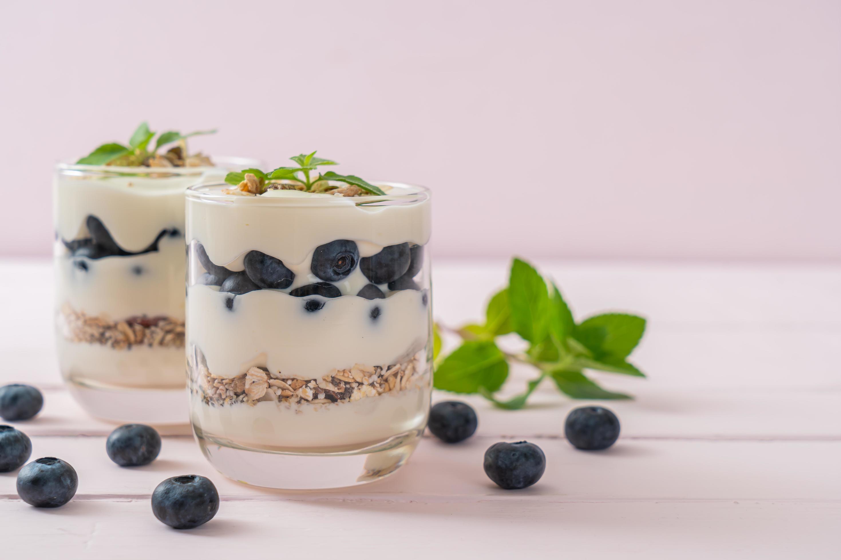 Fresh blueberries and yogurt with granola – Healthy food style Stock Free