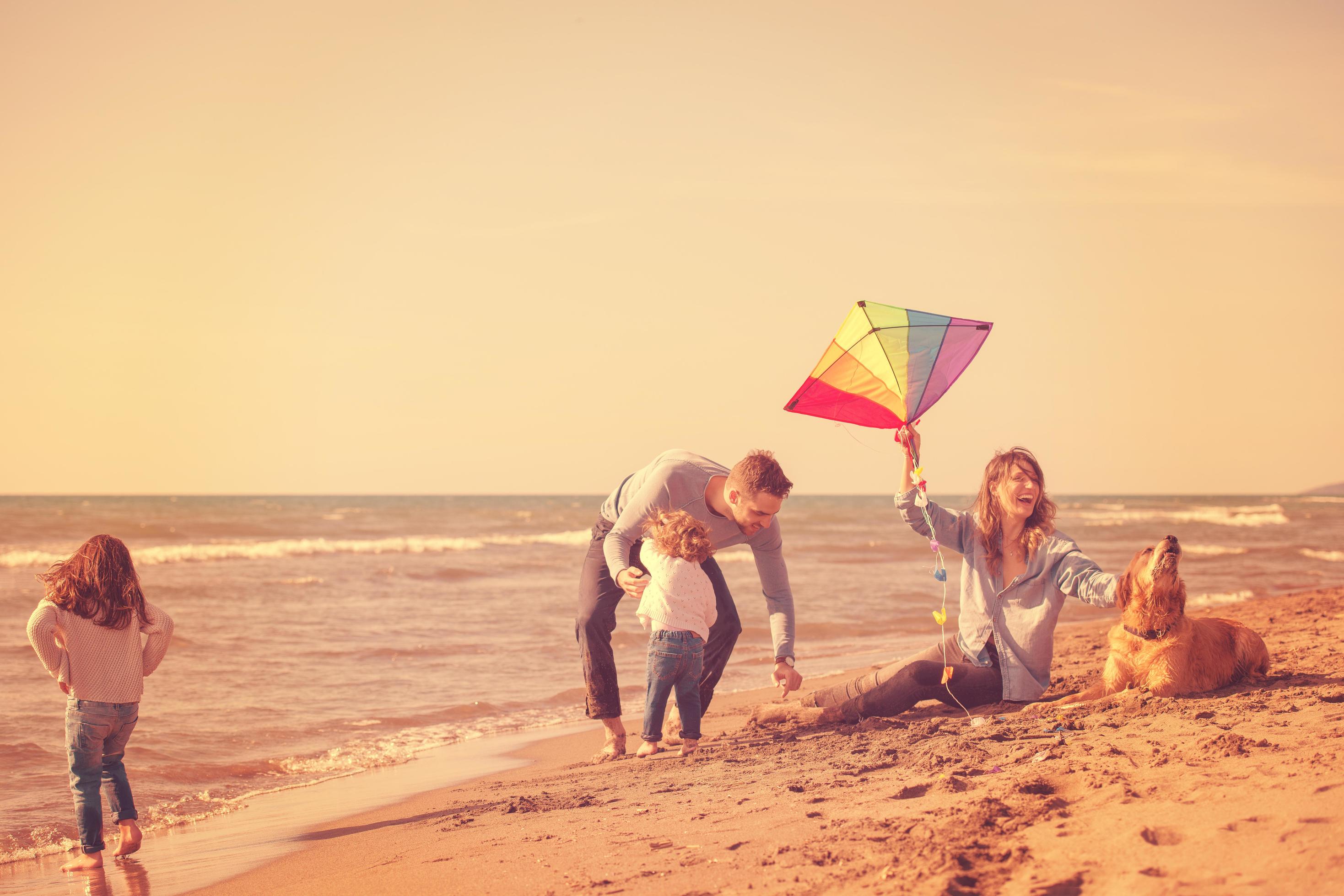 happy young family enjoying vecation during autumn day Stock Free