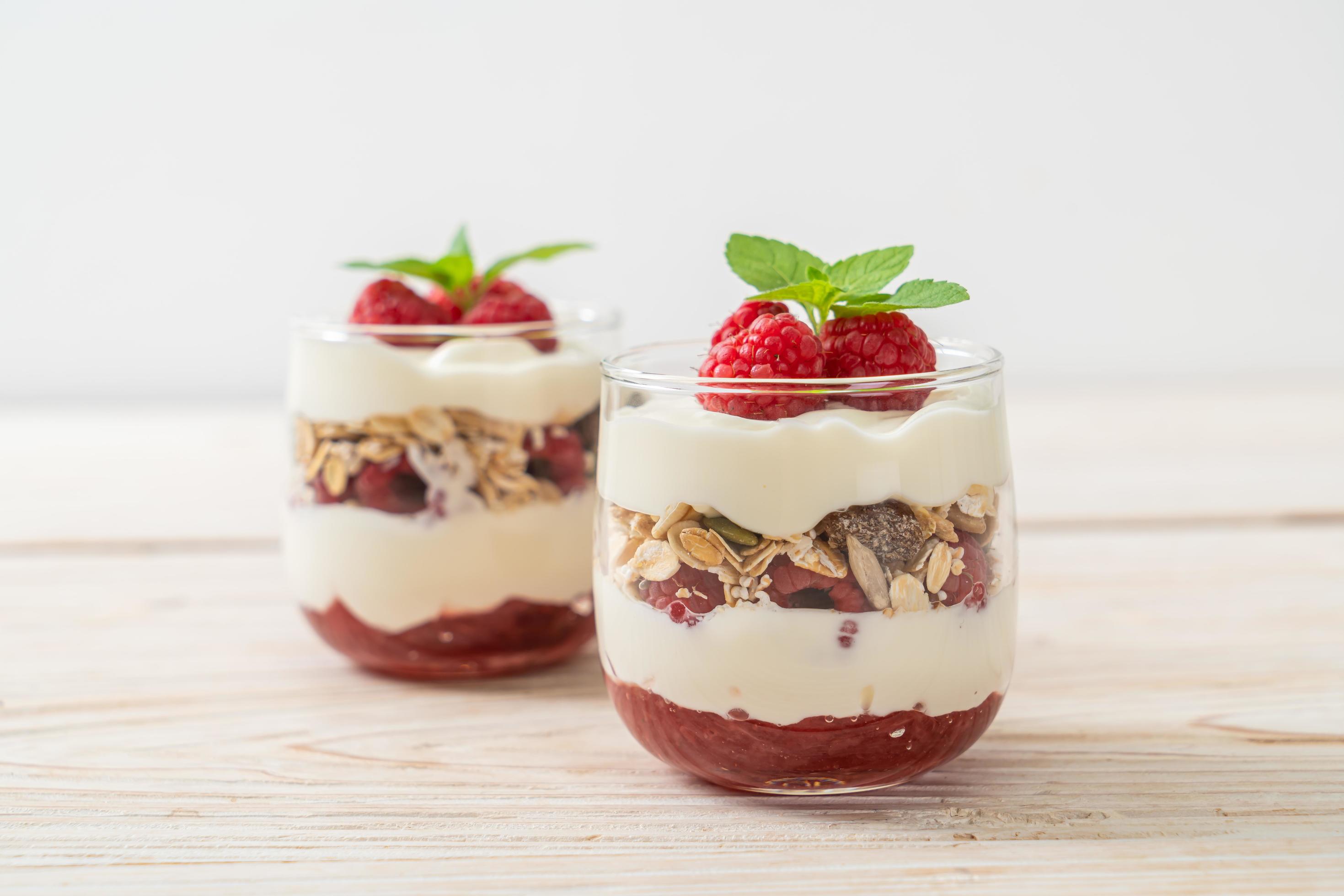 Fresh raspberry and yogurt with granola – Healthy food style Stock Free