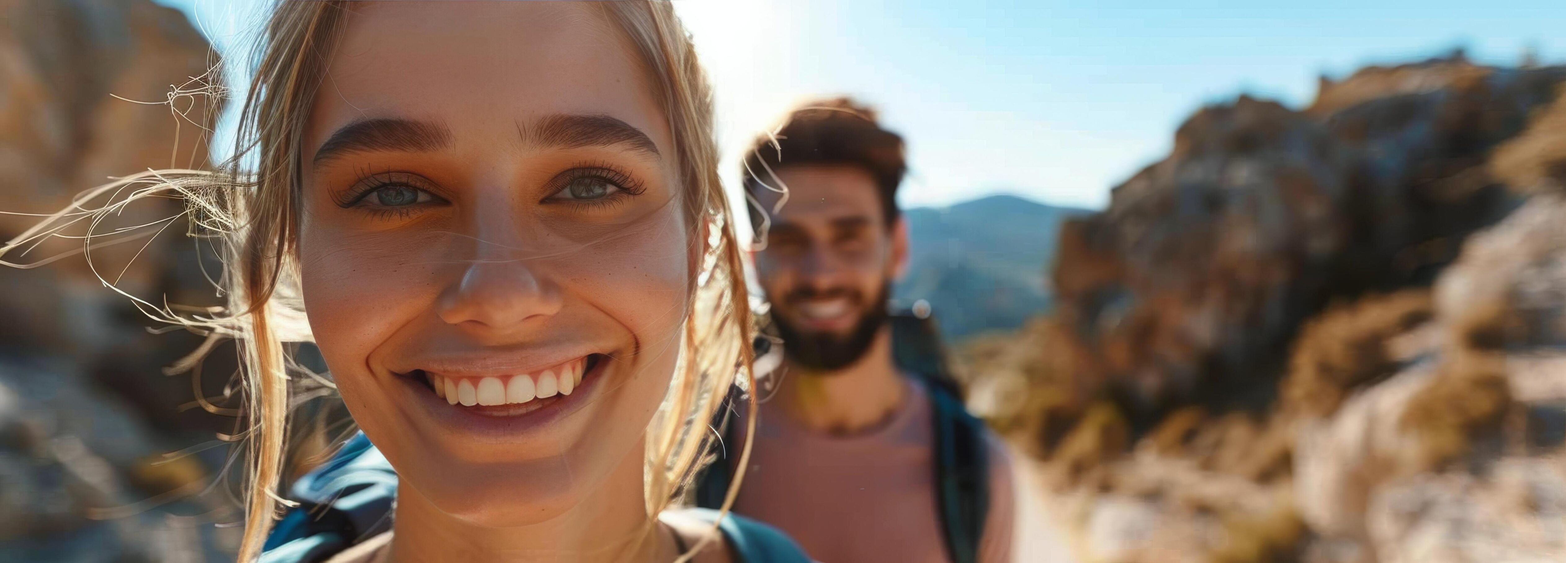 Smiling Woman Hiking With Backpack on Sunny Day Stock Free