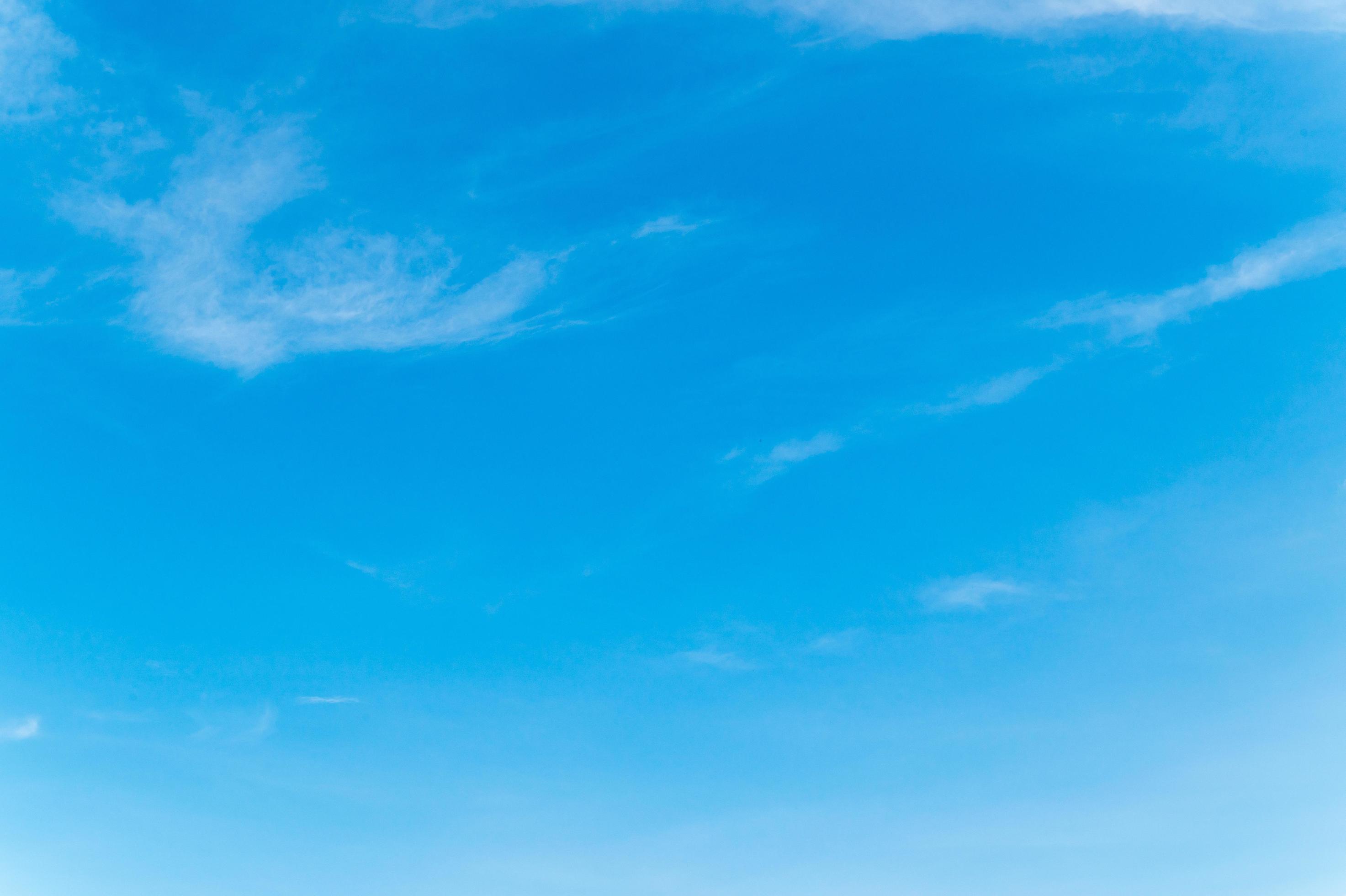 Beautiful white fluffy clouds in blue sky. Nature background from white cloud in sunny day Stock Free