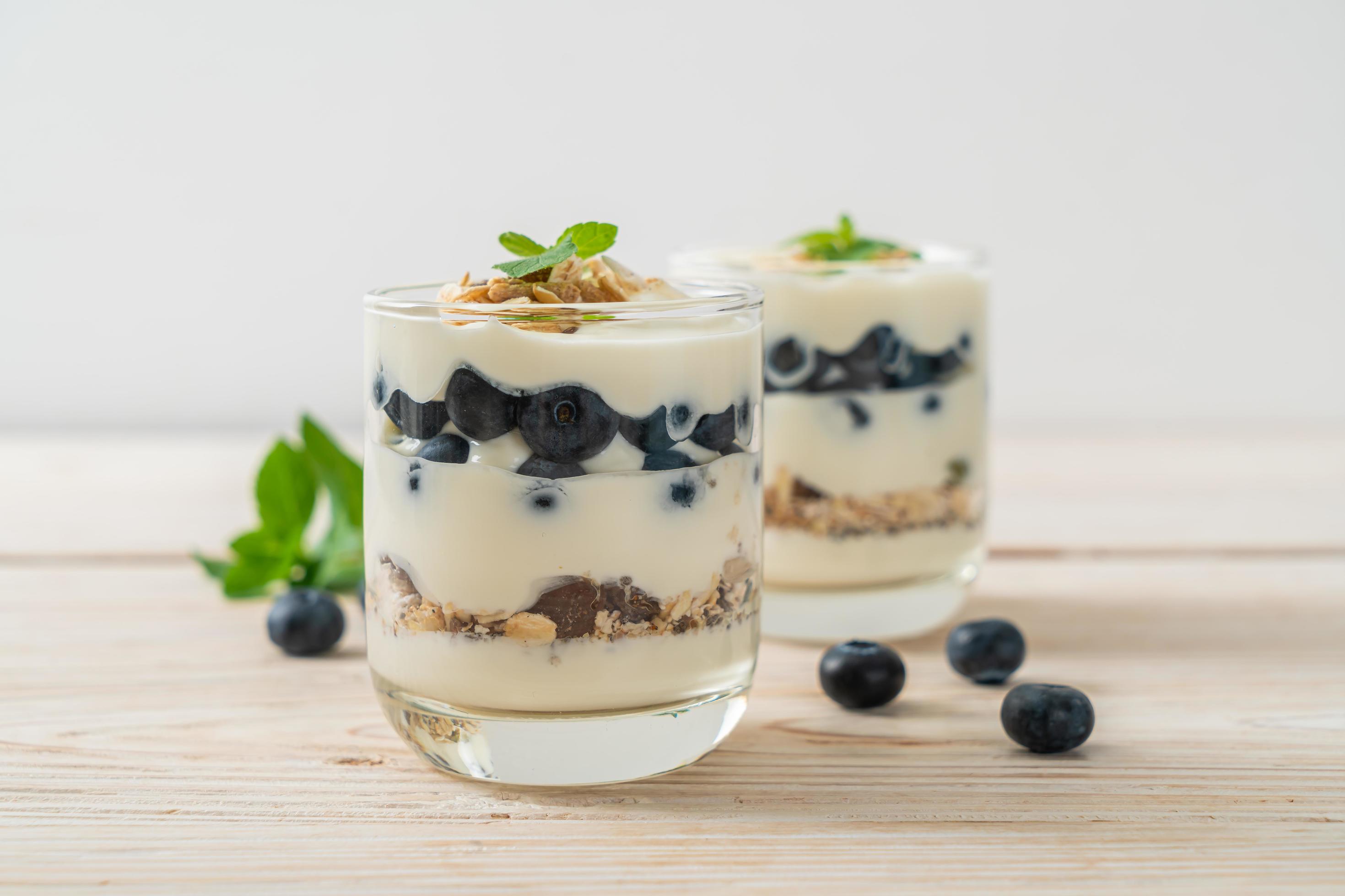 Fresh blueberries and yogurt with granola – Healthy food style Stock Free