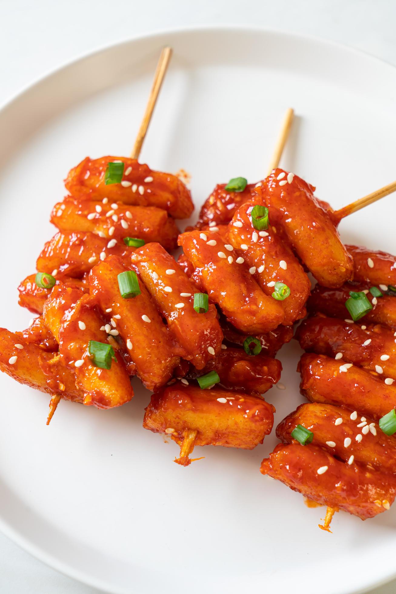 Deep-fried Korean rice cake, or Tteokbokki, with spicy sauce – Korean food style Stock Free