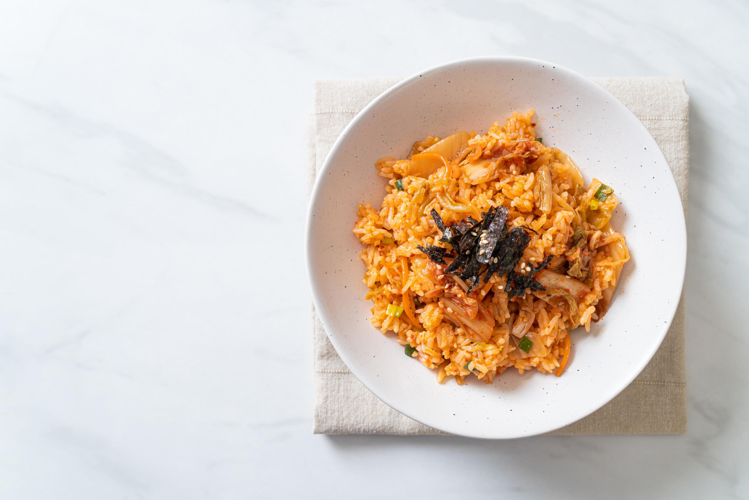 Kimchi fried rice with seaweed and white sesame – Korean food style Stock Free