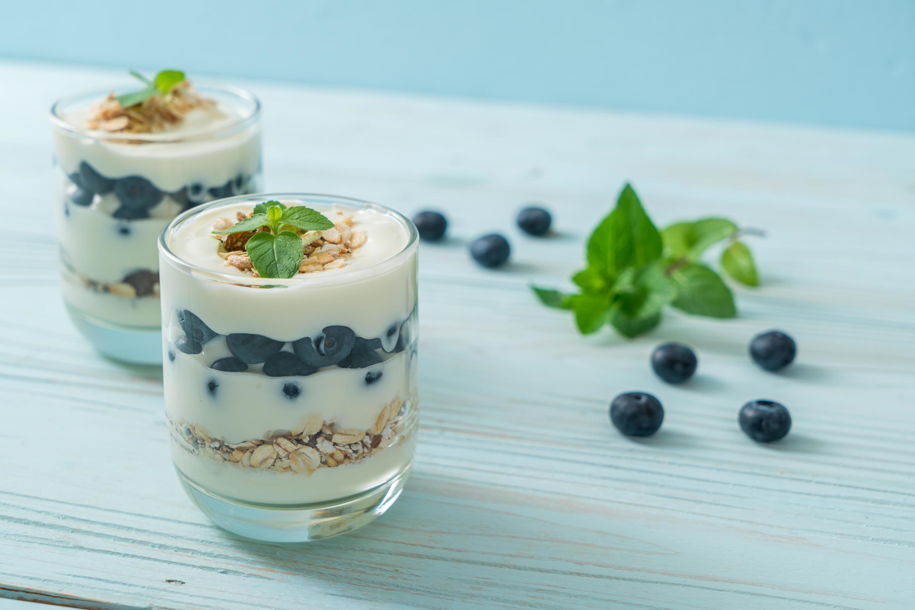 Fresh blueberries and yogurt with granola – Healthy food style Stock Free