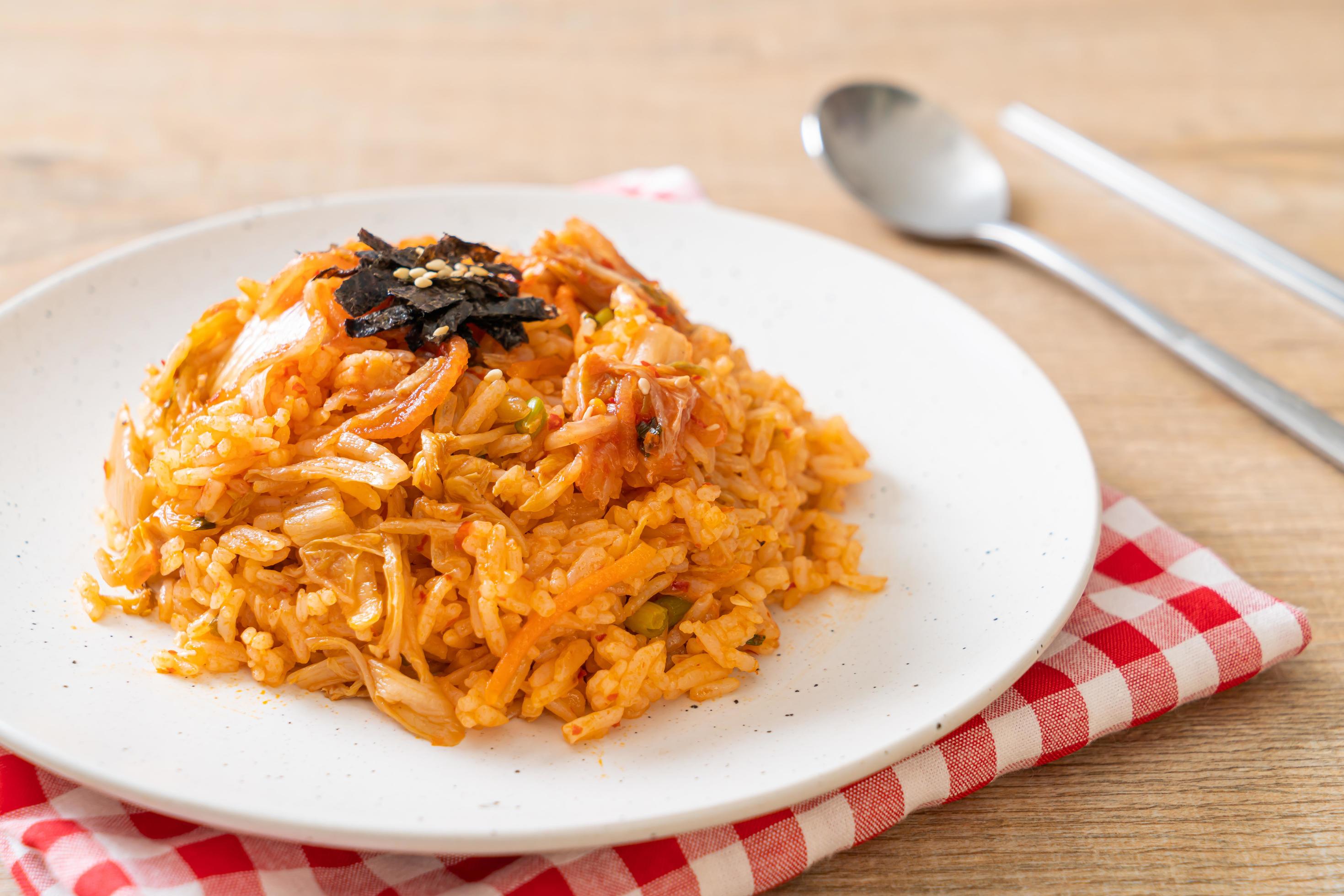 Kimchi fried rice with seaweed and white sesame – Korean food style Stock Free