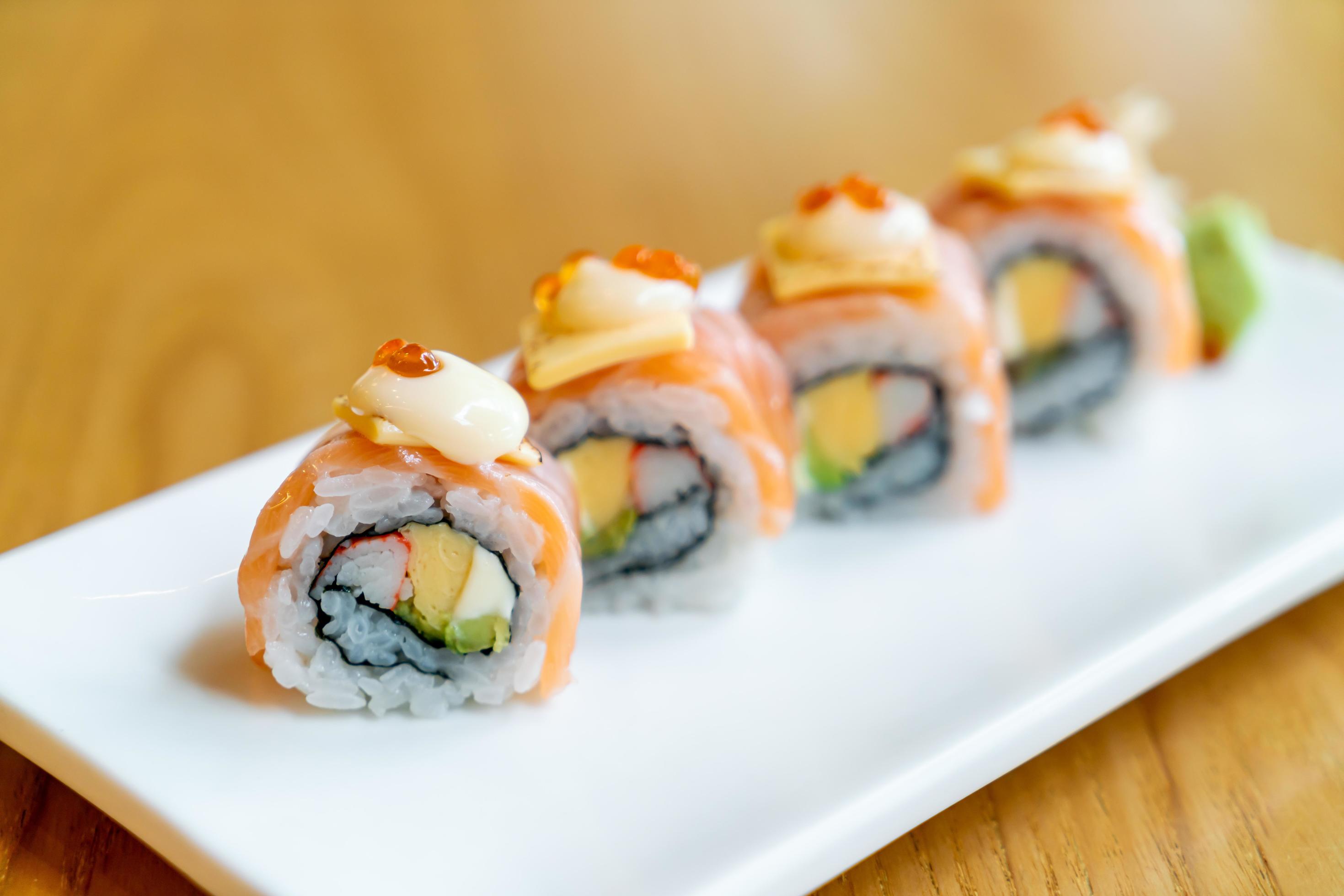 Salmon roll sushi with cheese on top – Japanese food style Stock Free