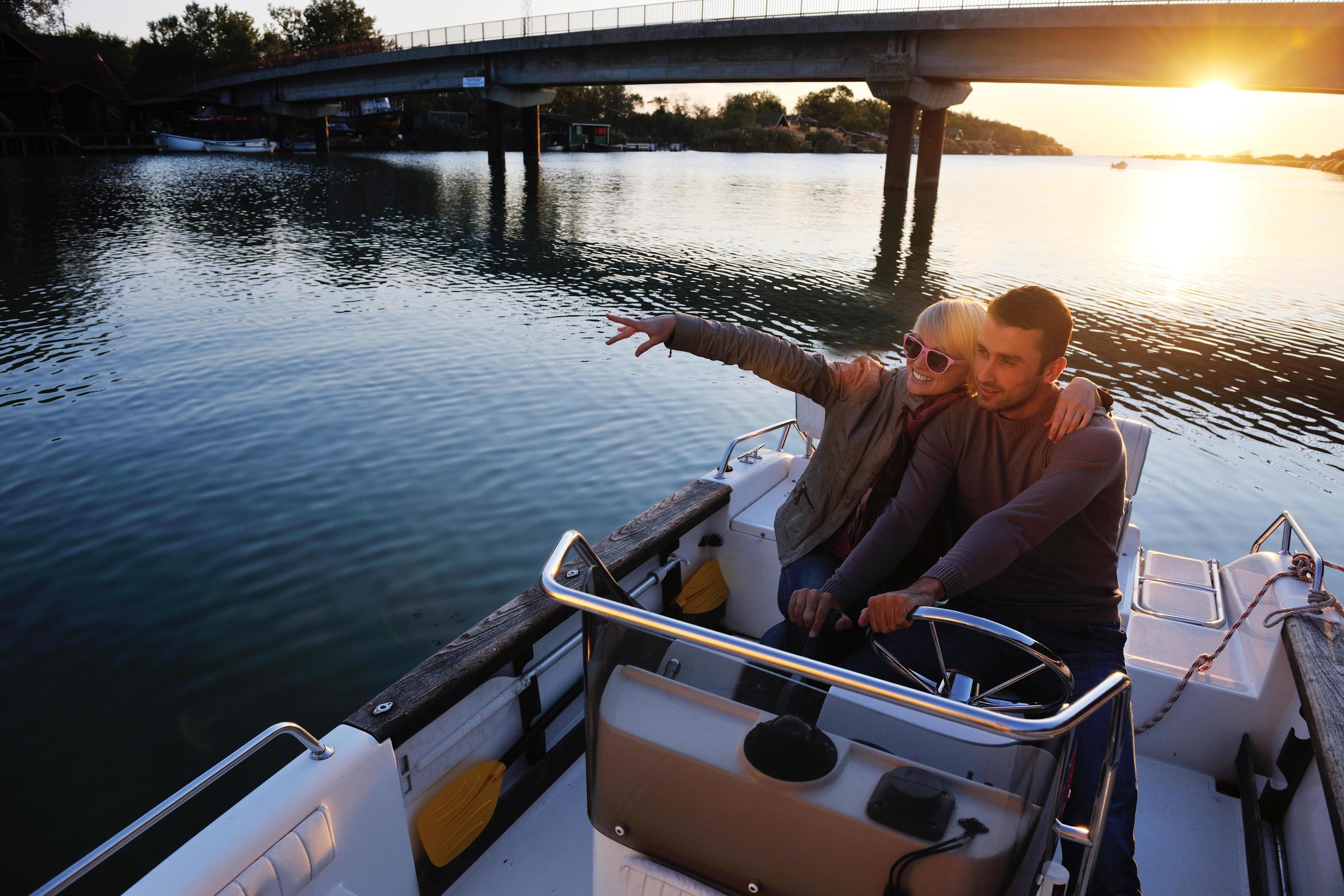 couple in love have romantic time on boat Stock Free