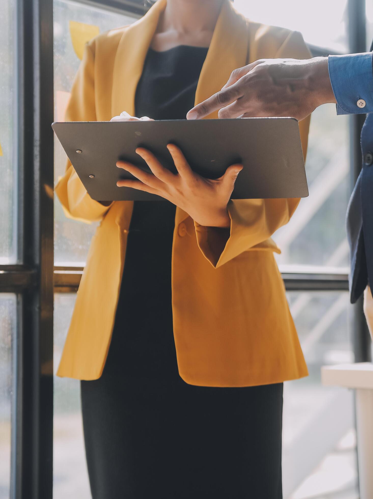 Close up of Business team analyzing income charts and graphs with modern laptop computer. Business analysis and strategy concept. Stock Free