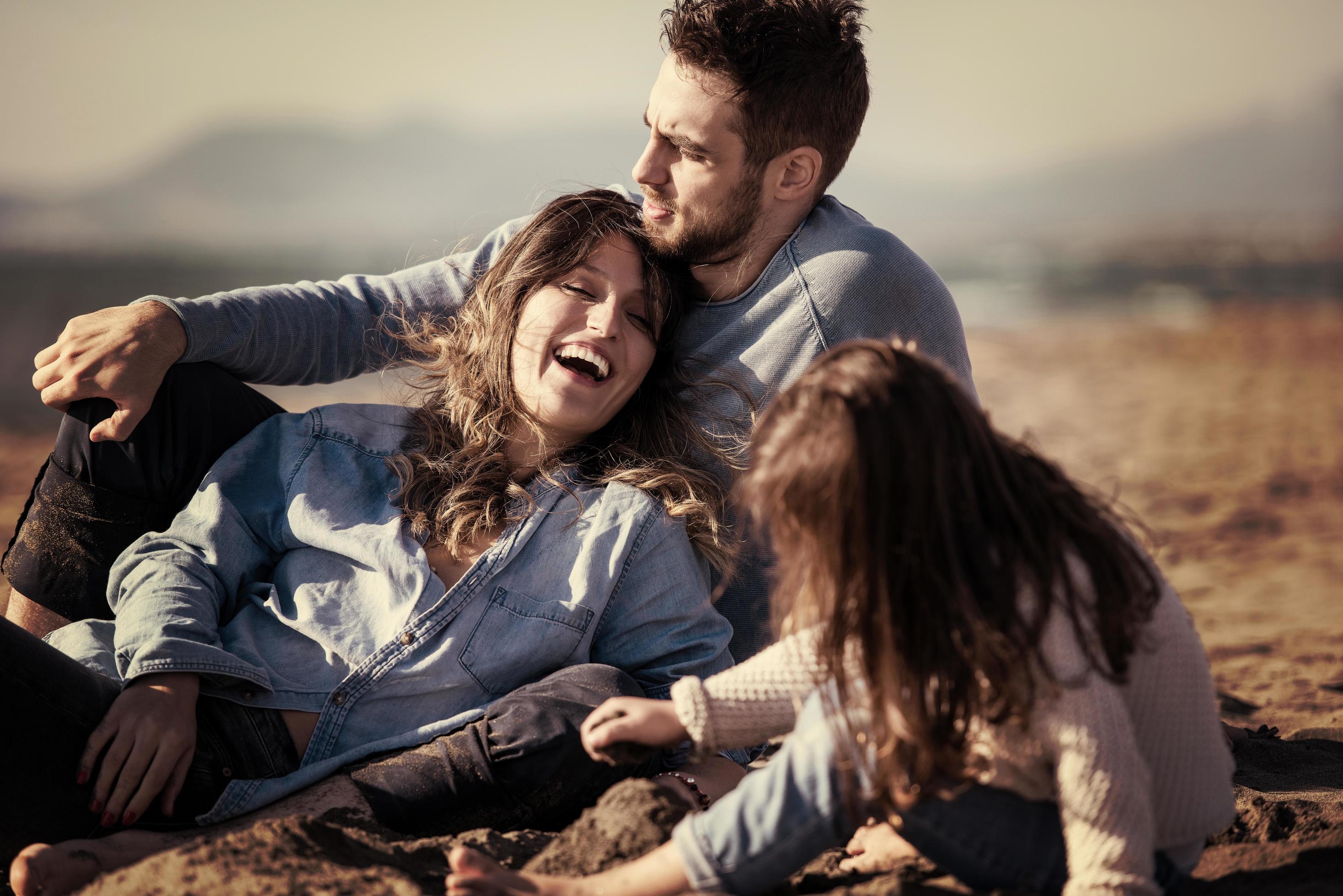 Young family enjoying vecation during autumn Stock Free