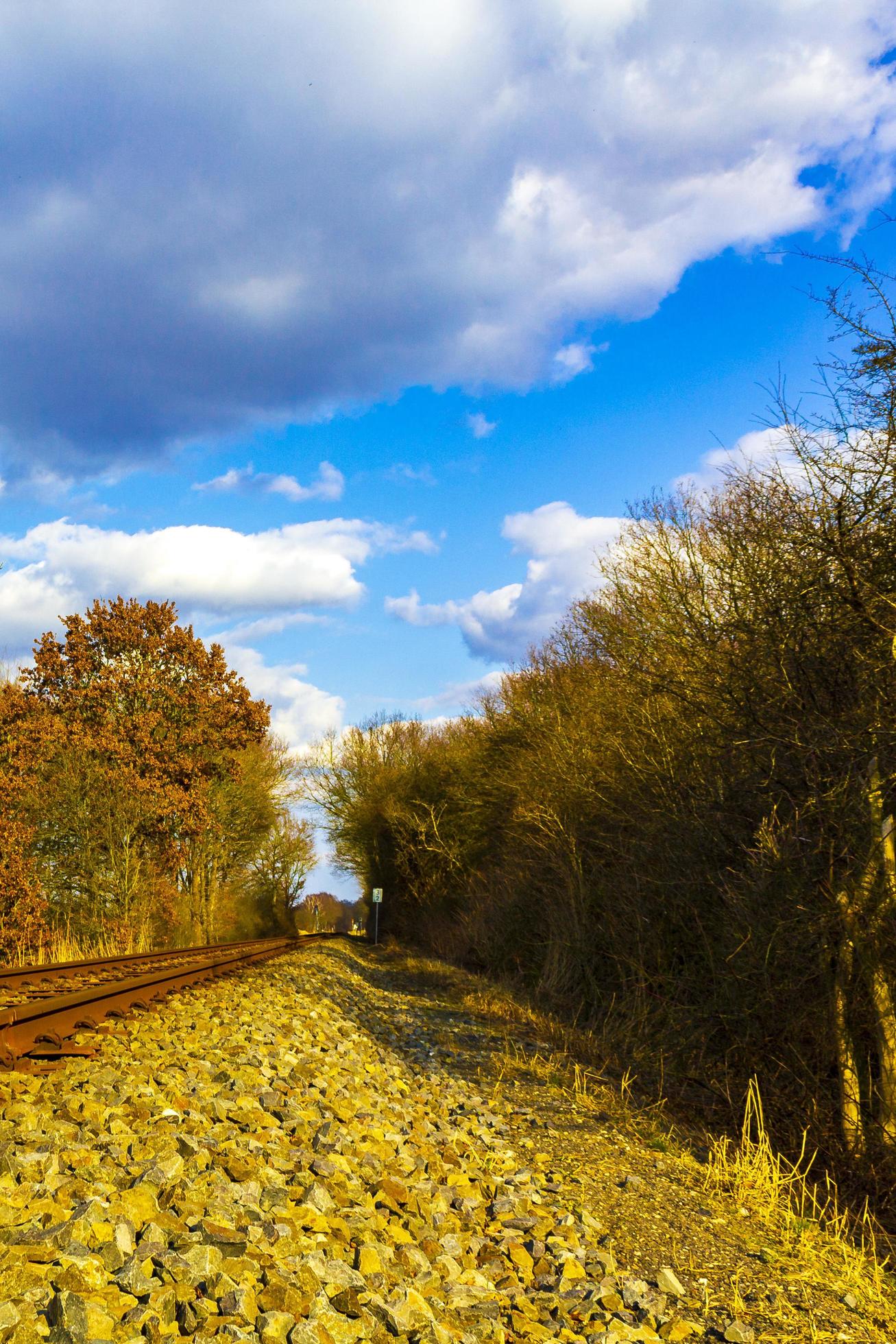 Train tracks through nature to infinity in Germany. Stock Free