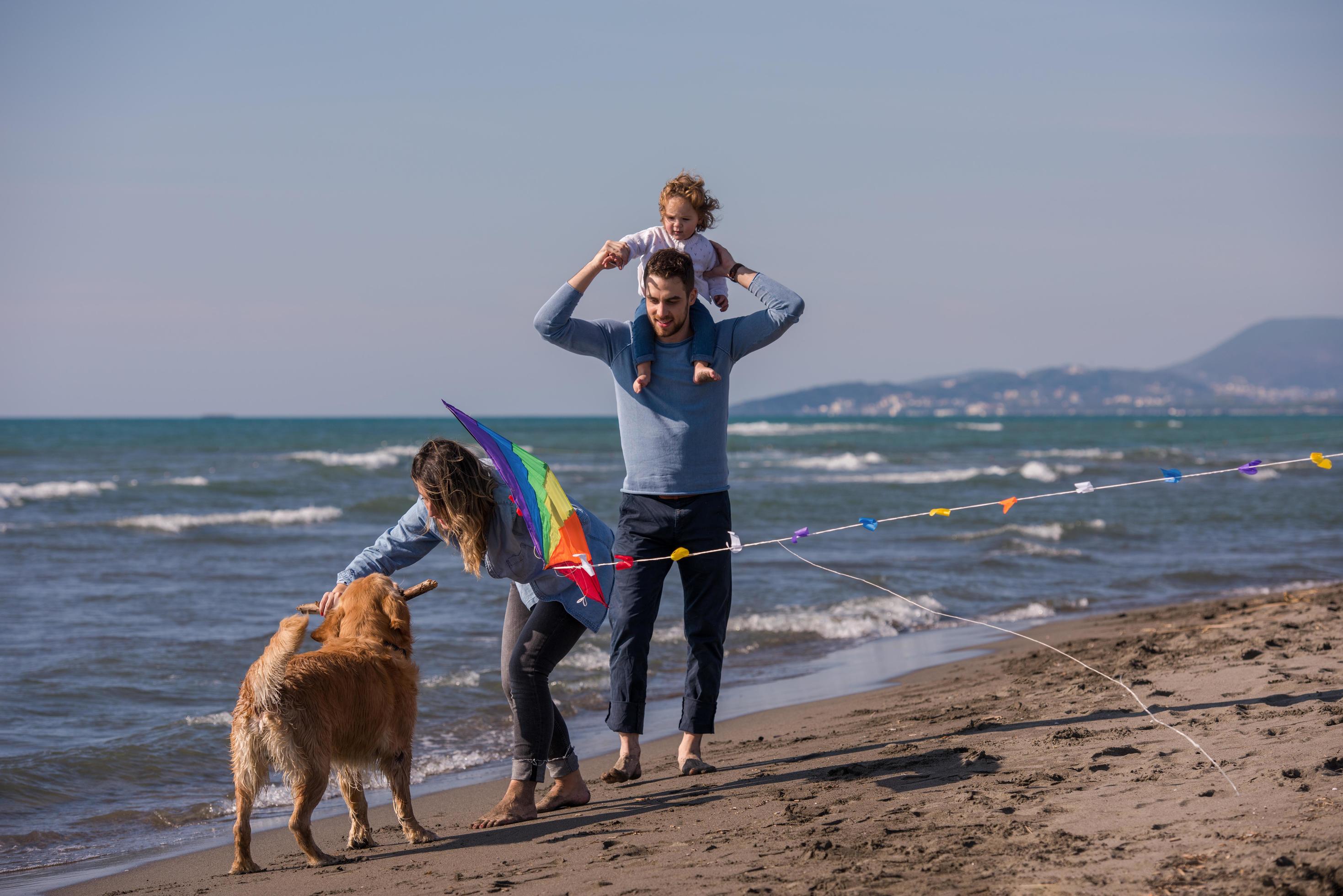 happy young family enjoying vecation during autumn day Stock Free