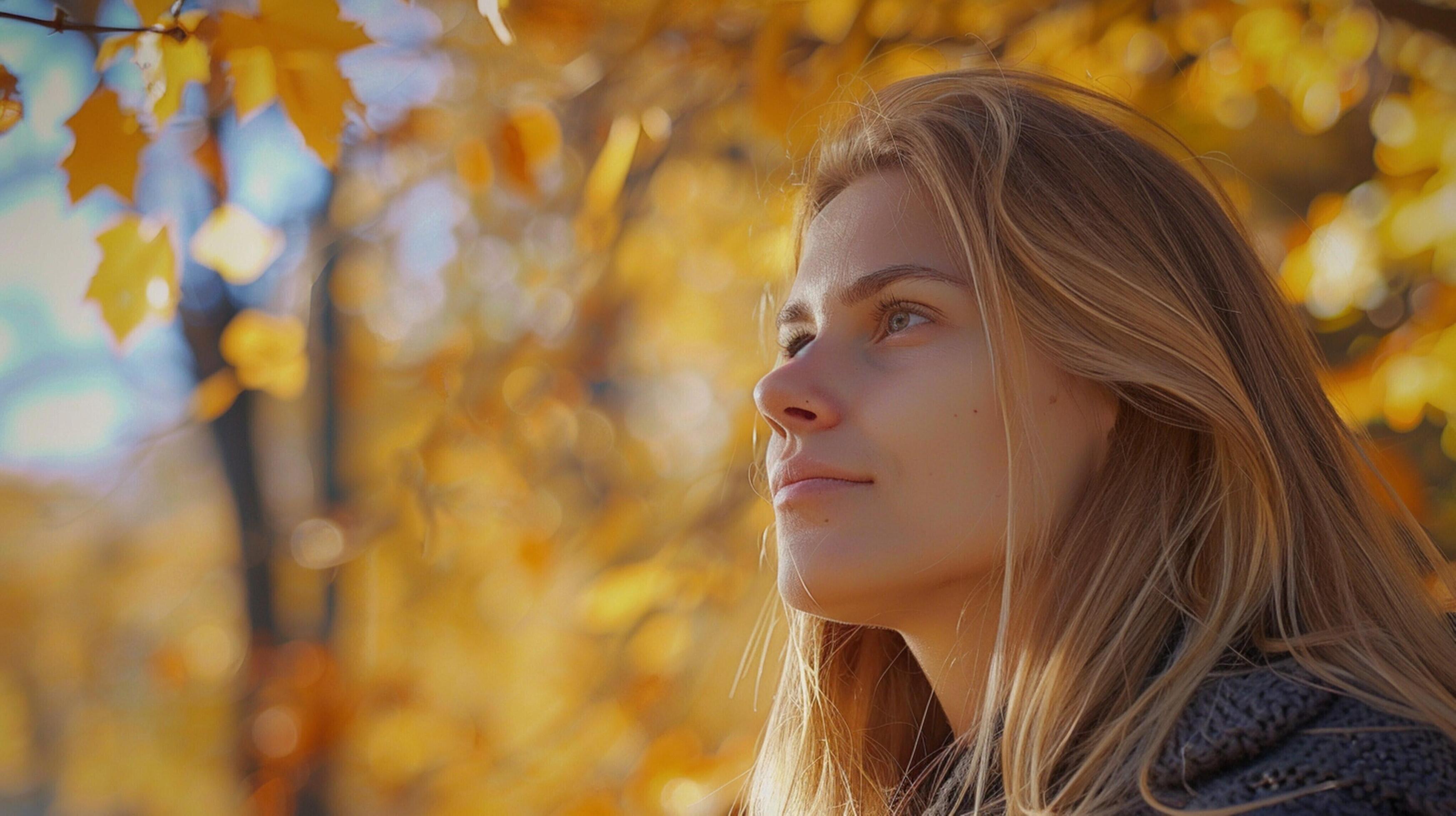 young woman with long blond hair enjoying autumn Stock Free