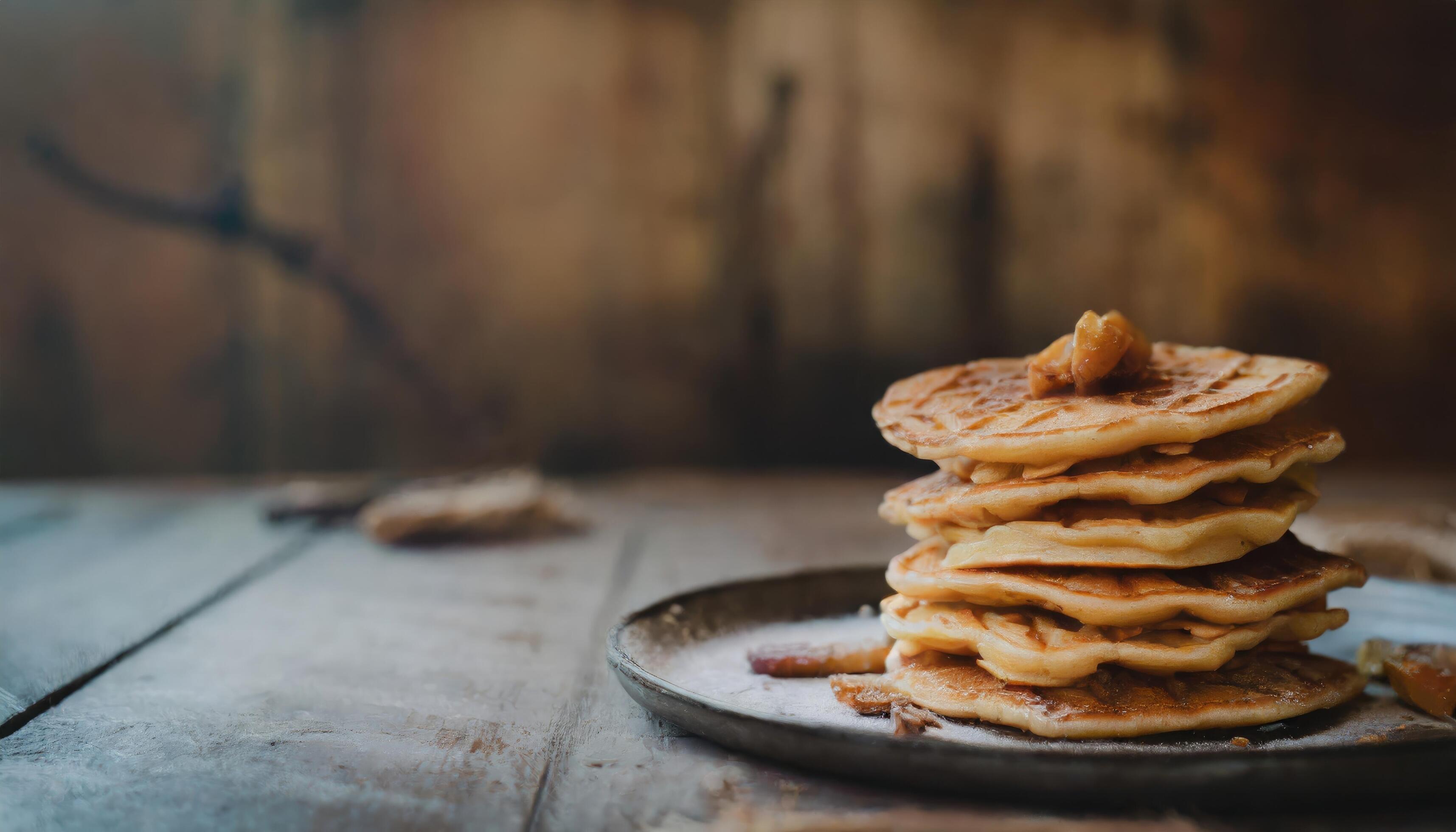 Copy Space image of Delicious viennese waffles with maple syrup drizzle and blackberry on dark brown wood background. Stock Free